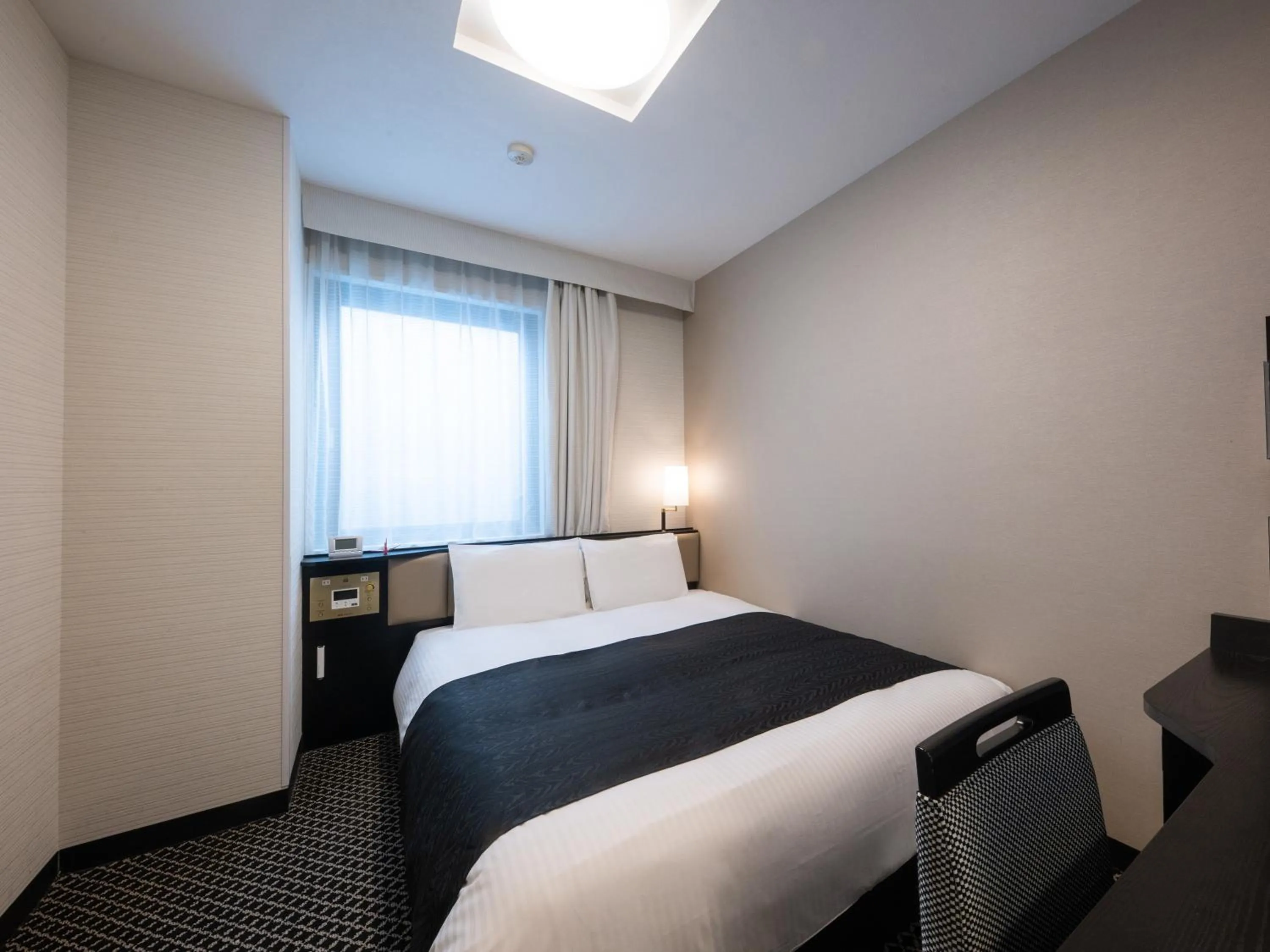 Bed in APA Hotel Nagoya Sakae Higashi