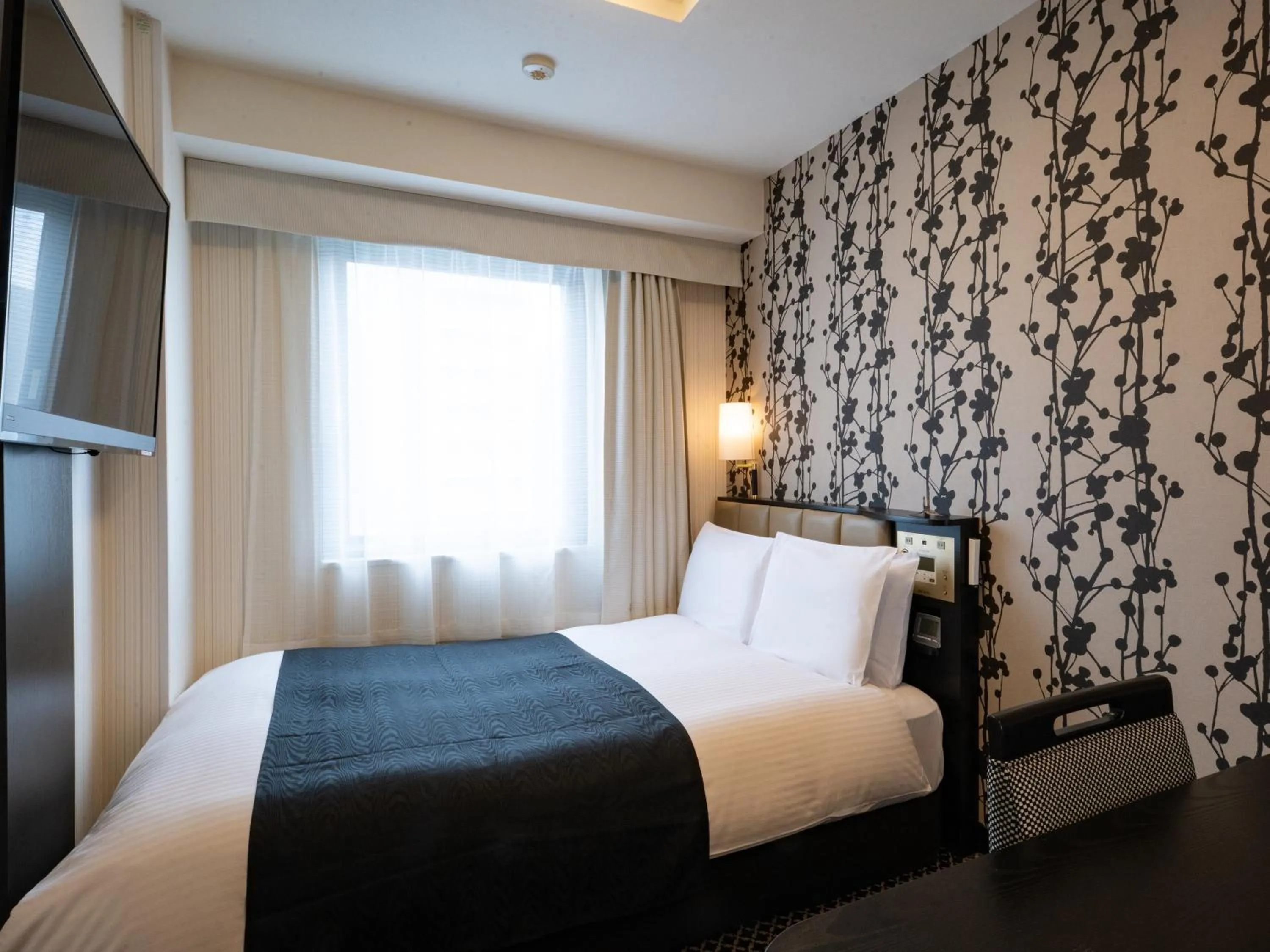 Bed in APA Hotel Nagoya Sakae Higashi