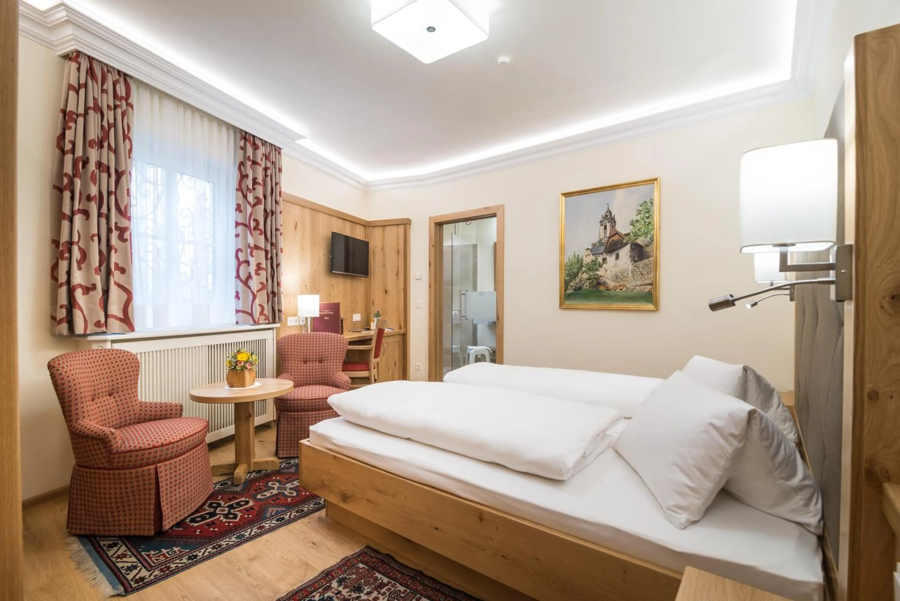 Photo of the whole room, Bed in Kirchenwirt Hotel Restaurant Wachau