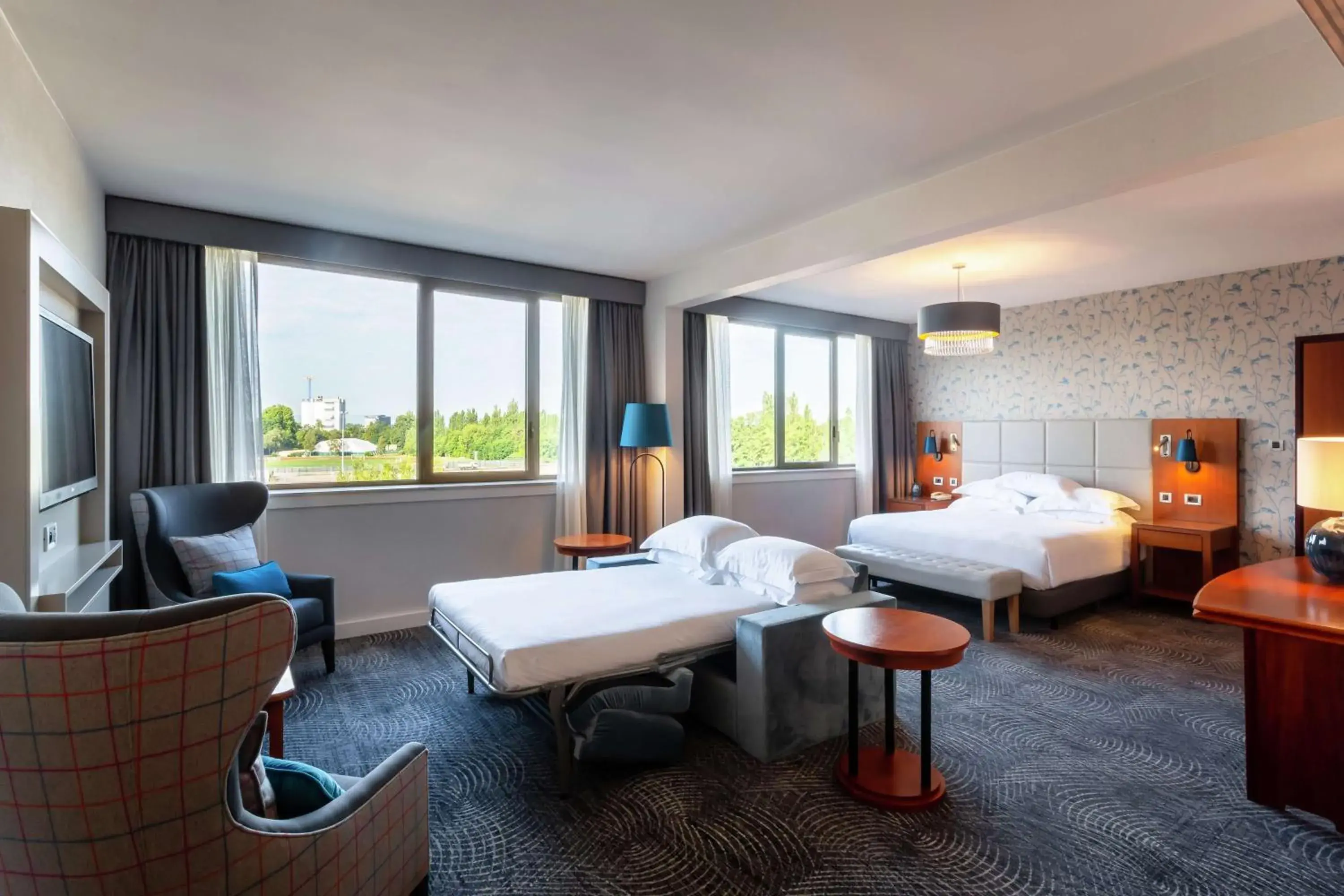 Living room, Bed in Hilton Strasbourg Living room, Bed in Hilton Strasbourg