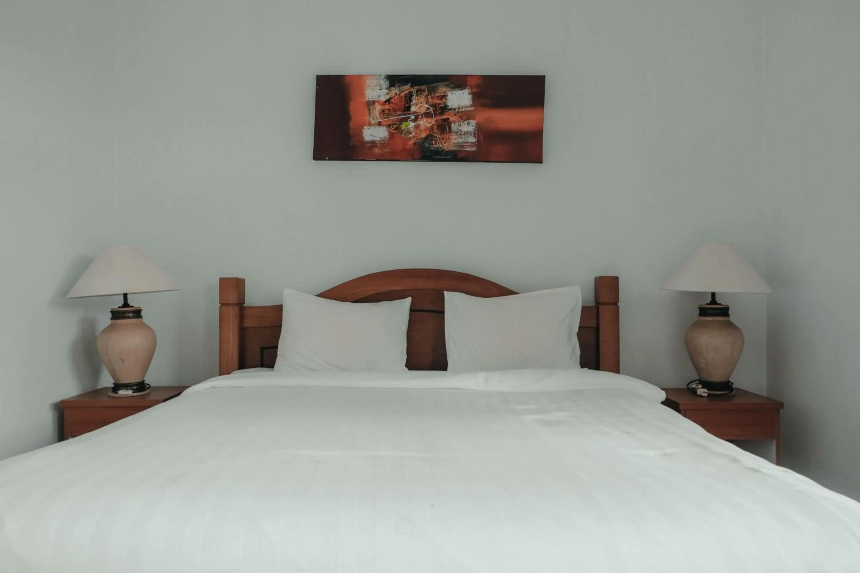 Photo of the whole room, Bed in Sekar Arum Riverside Resort in Canggu