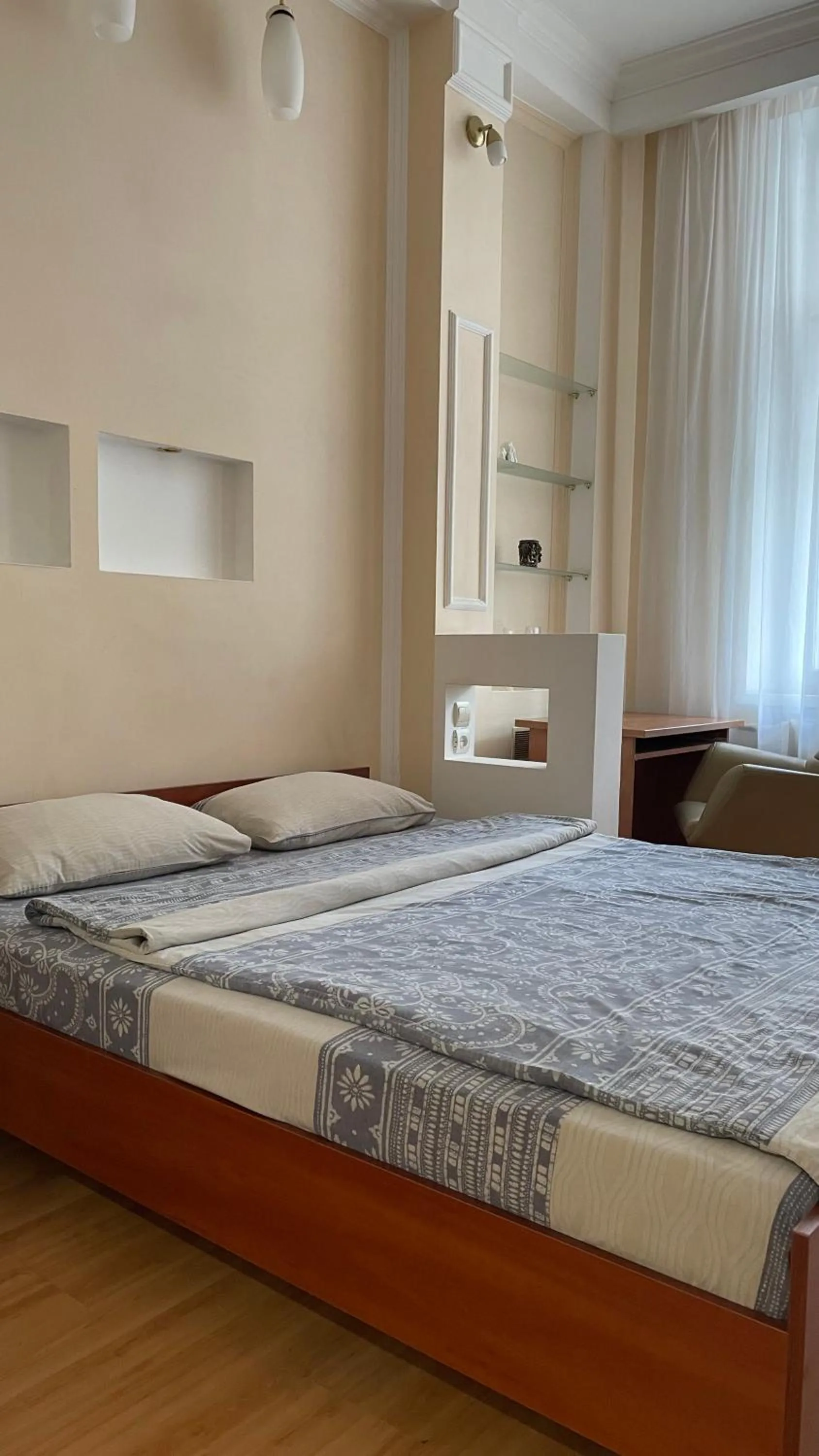 Bed in Babylon Apartments on Petliury Street