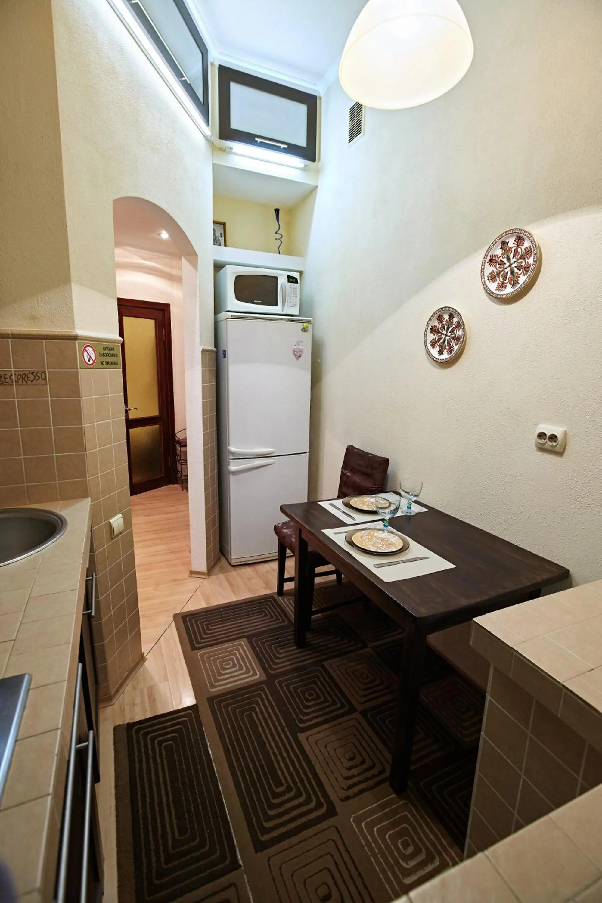 Dining area in Babylon Apartments on Petliury Street