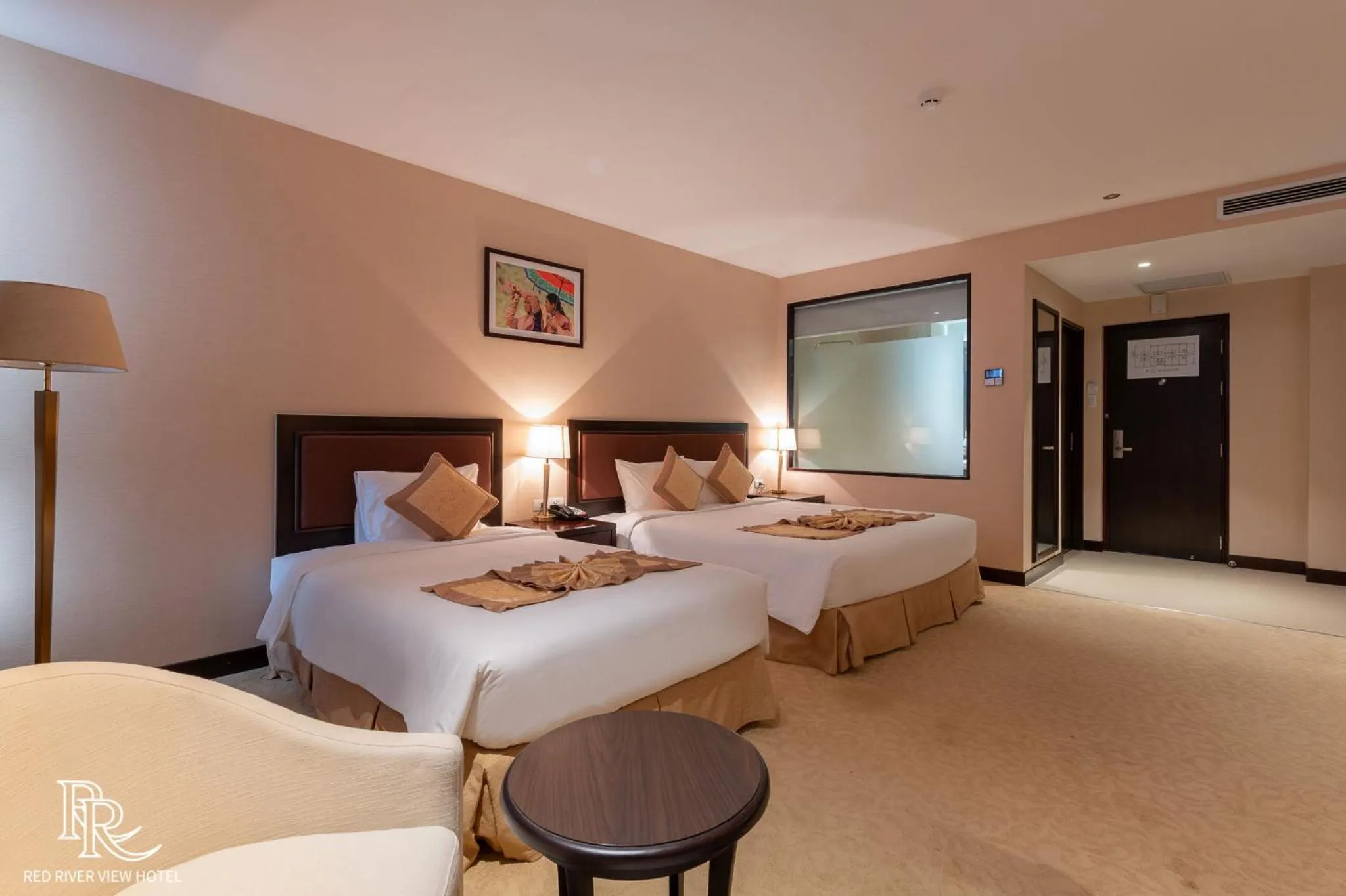 Bed in Red River View Hotel