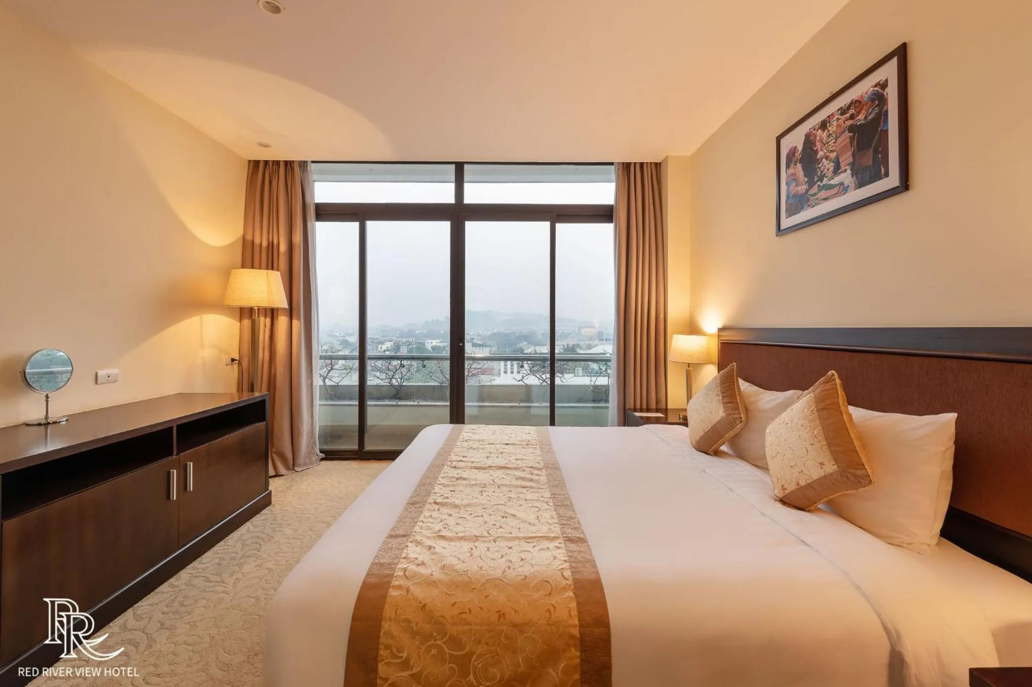 Bed in Red River View Hotel