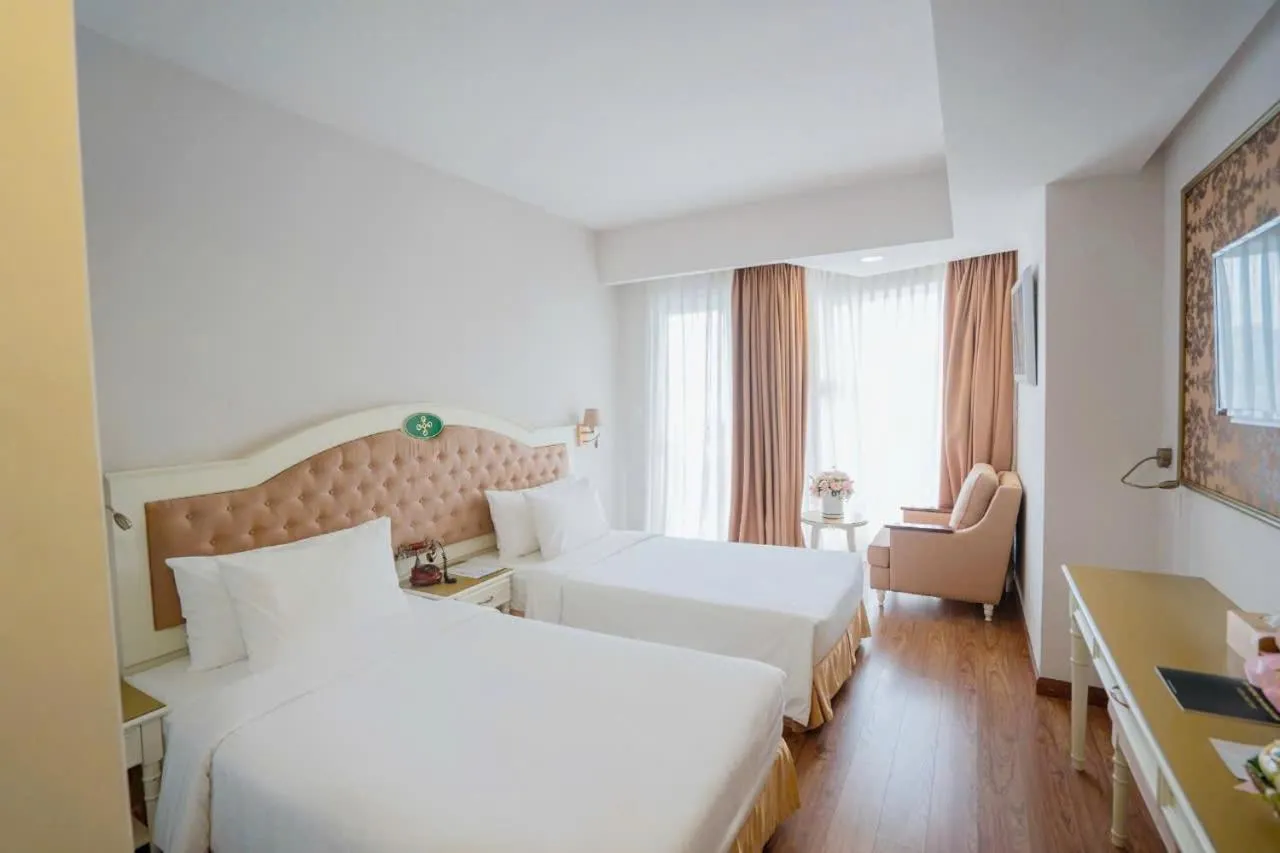 Bed in Isena Nha Trang Hotel