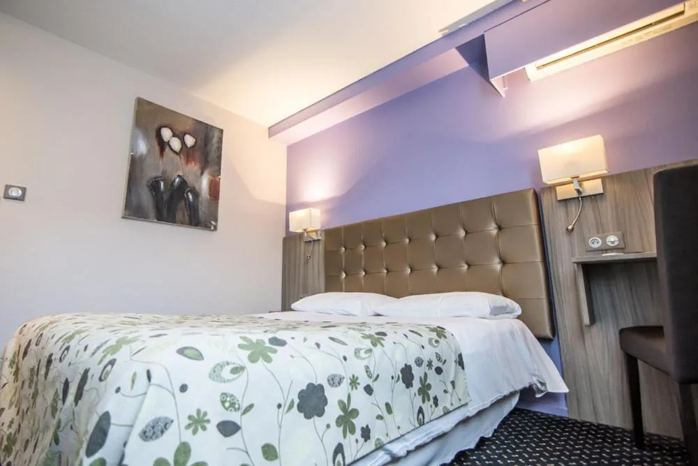 Photo of the whole room, Bed in Brit Hotel Confort Foix