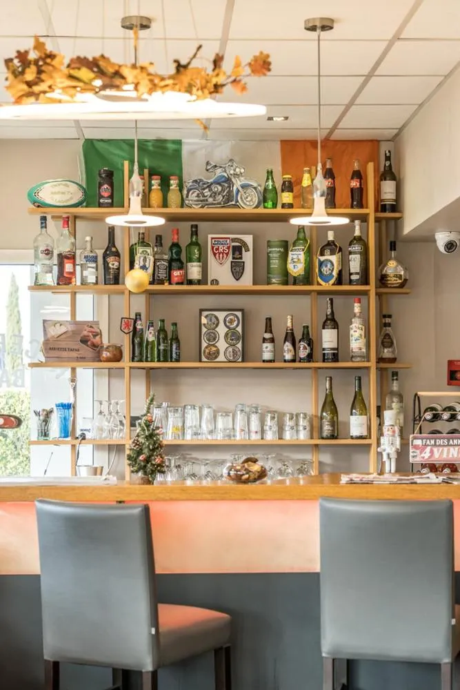 Lounge or bar in Brit Hotel Confort Foix