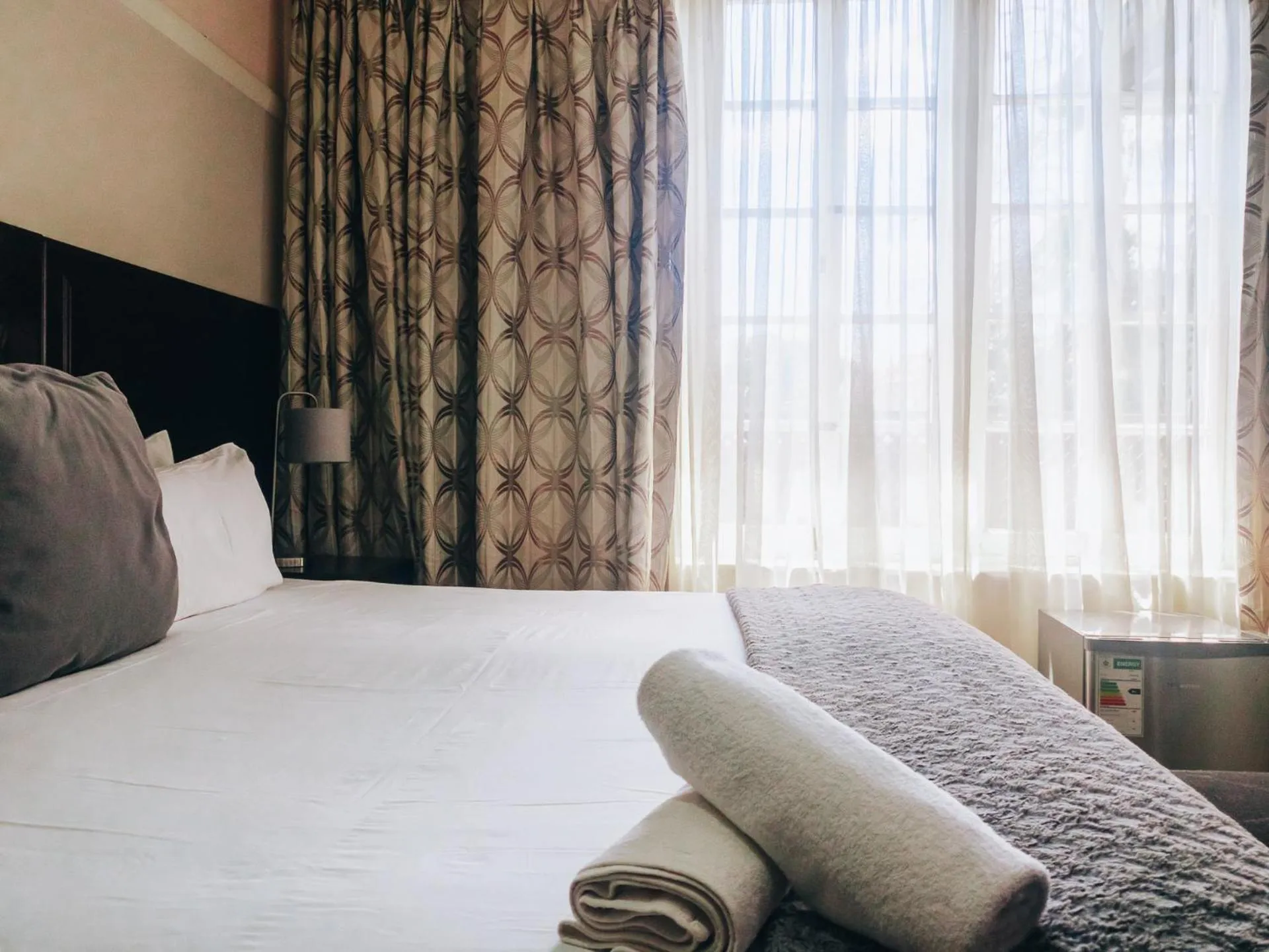 Bed in New England Guest House by Ilawu