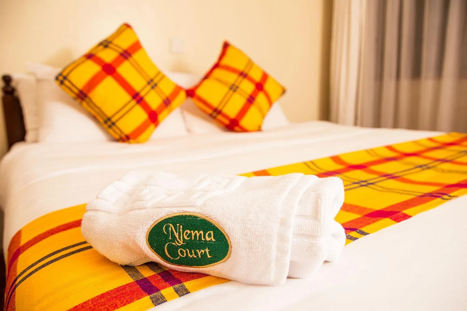 Bed in Njema Court Apartment