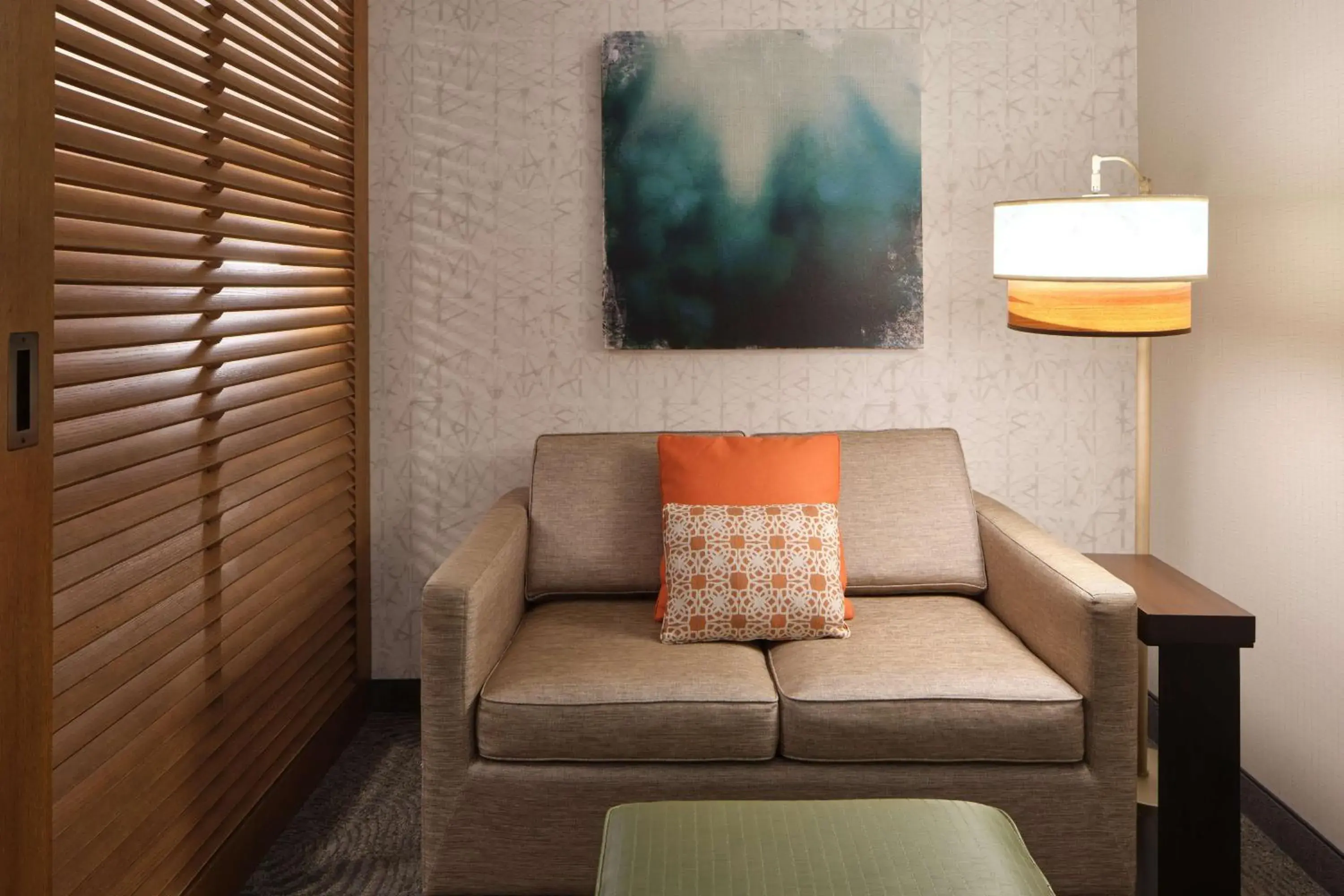 Living room in Embassy Suites By Hilton Oahu Kapolei - FREE Breakfast Living room in Embassy Suites By Hilton Oahu Kapolei - FREE Breakfast