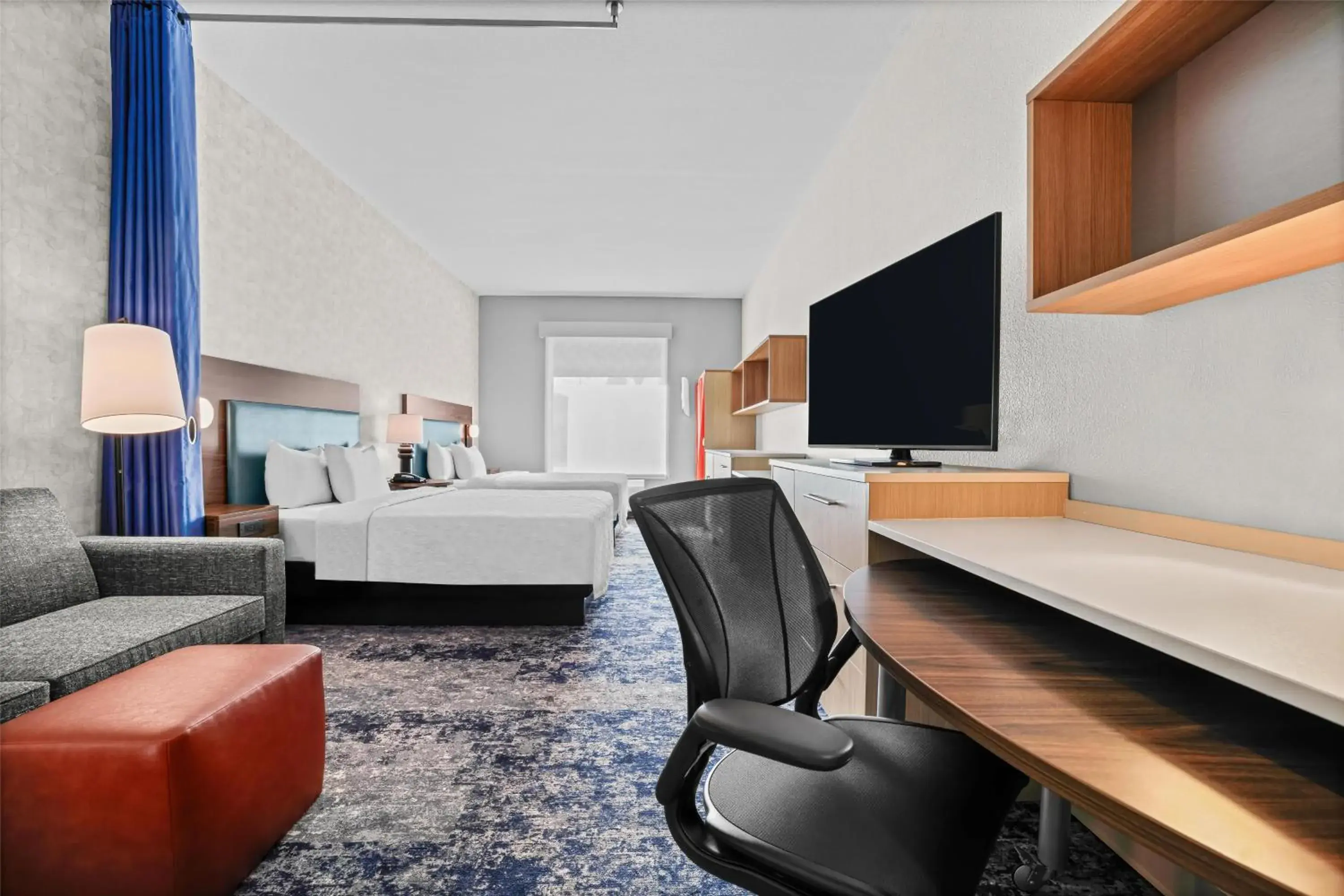 Living room, Bed in Home2 Suites By Hilton Pigeon Forge Living room, Bed in Home2 Suites By Hilton Pigeon Forge