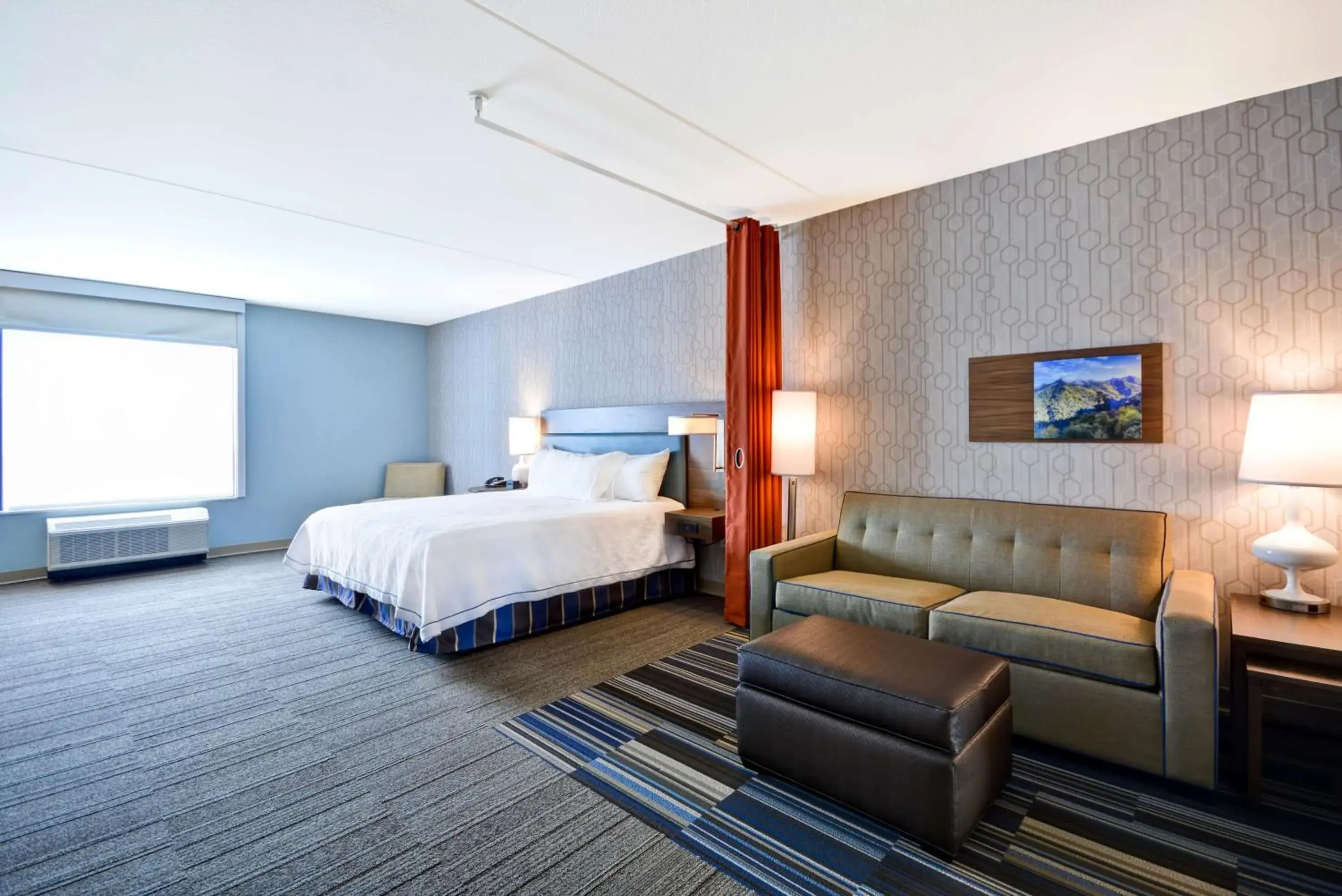 Living room, Bed in Home2 Suites By Hilton Pigeon Forge Living room, Bed in Home2 Suites By Hilton Pigeon Forge