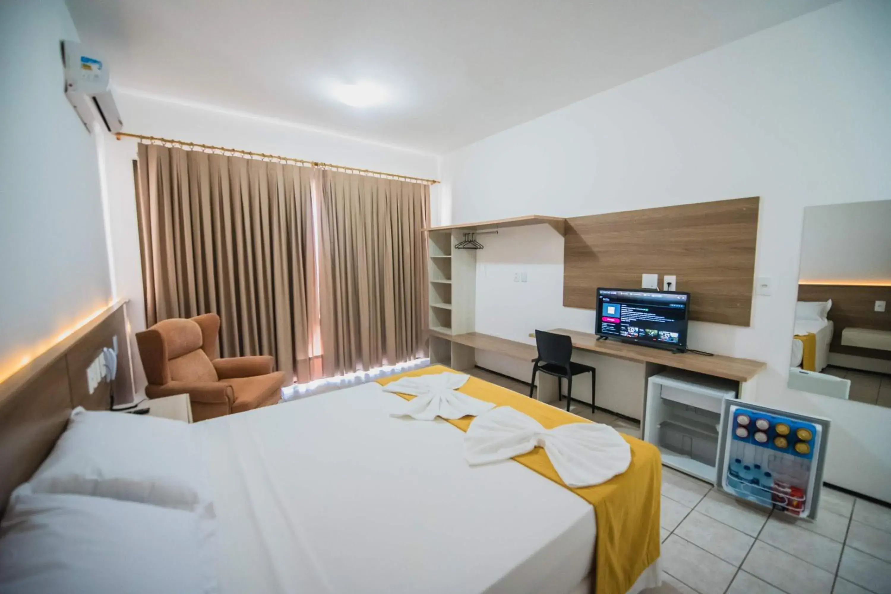 Bed in Milos Beach Hotel Bed in Milos Beach Hotel