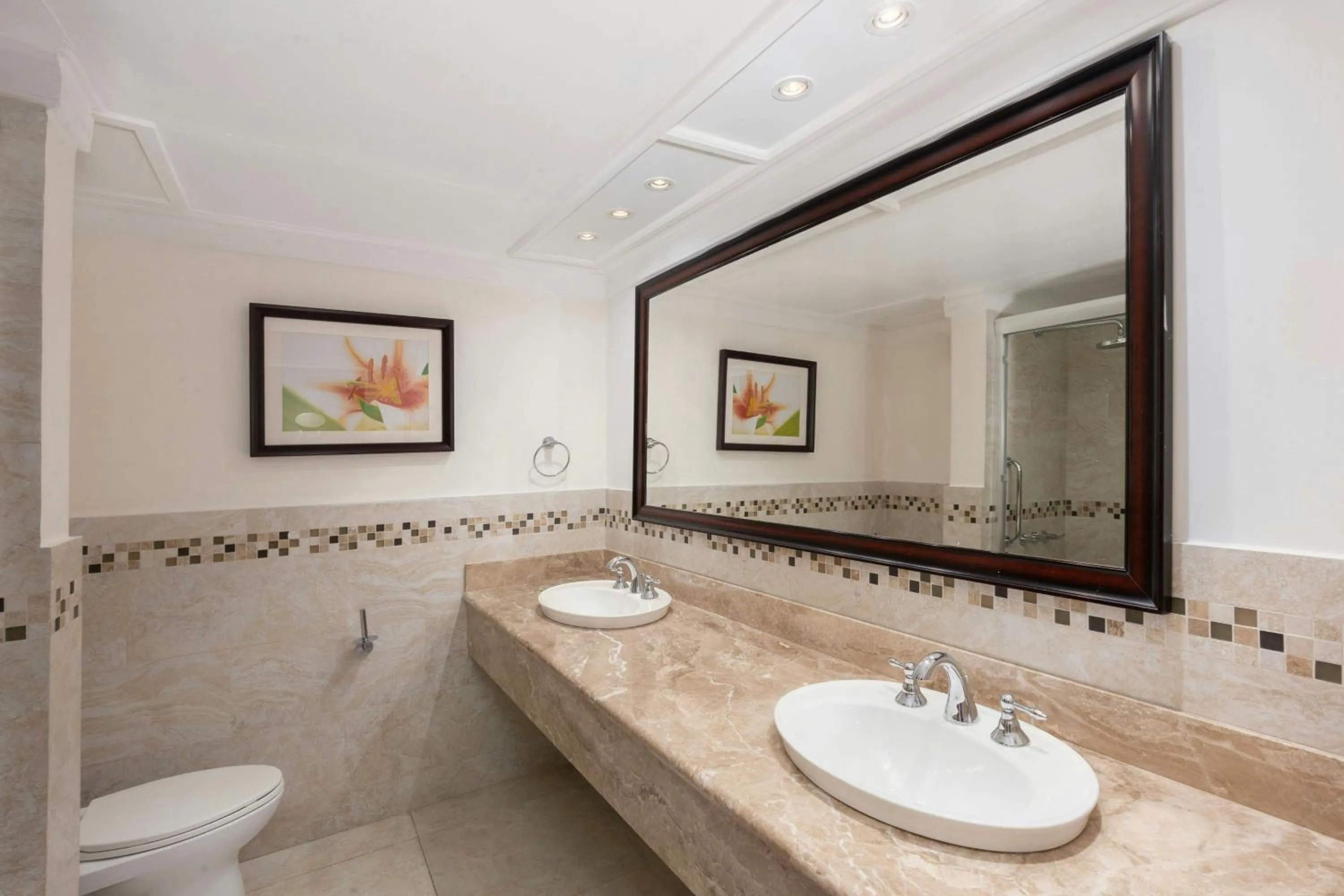 Bathroom in Tamarind by Elegant Hotels - All-Inclusive