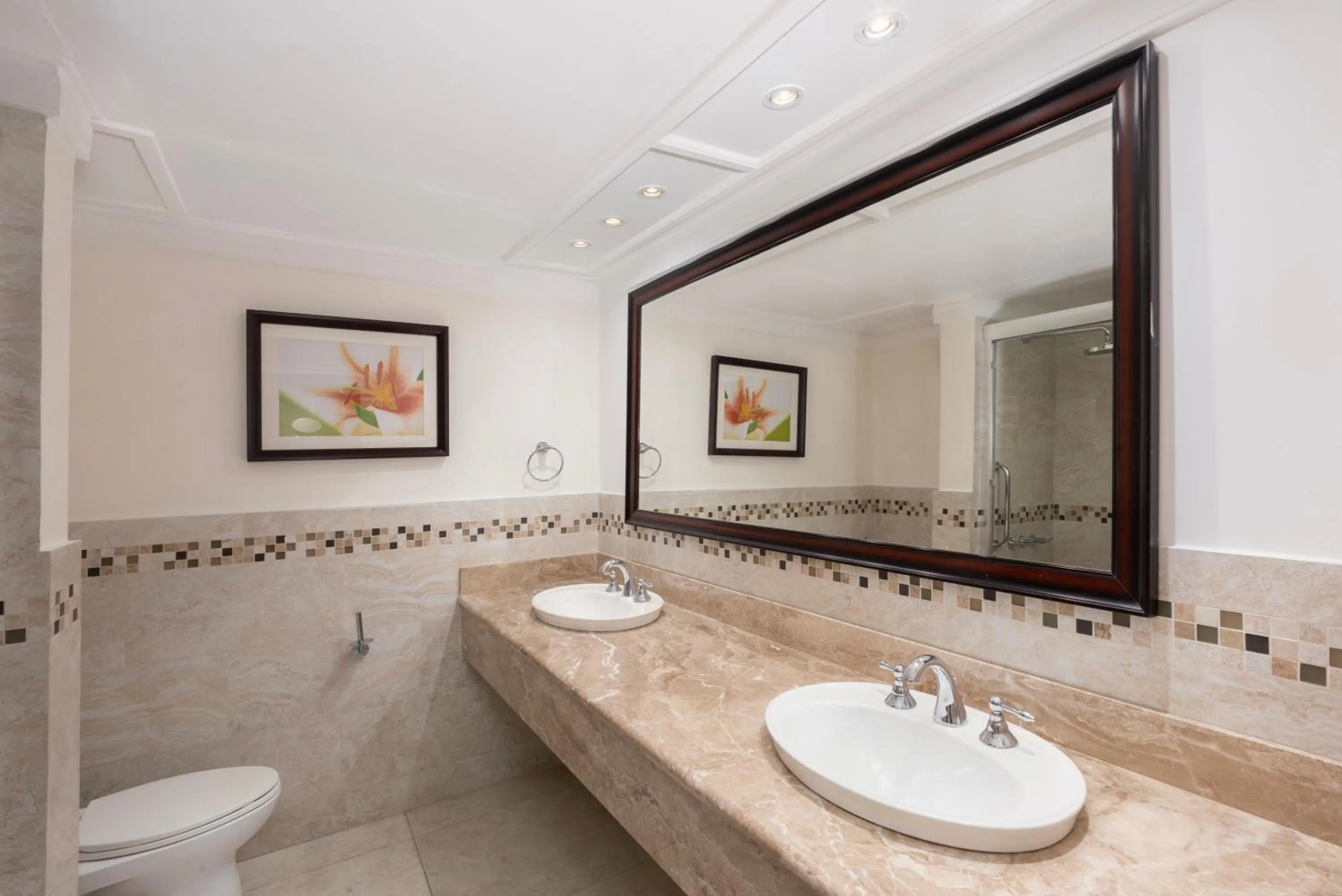 Bathroom in Tamarind by Elegant Hotels - All-Inclusive