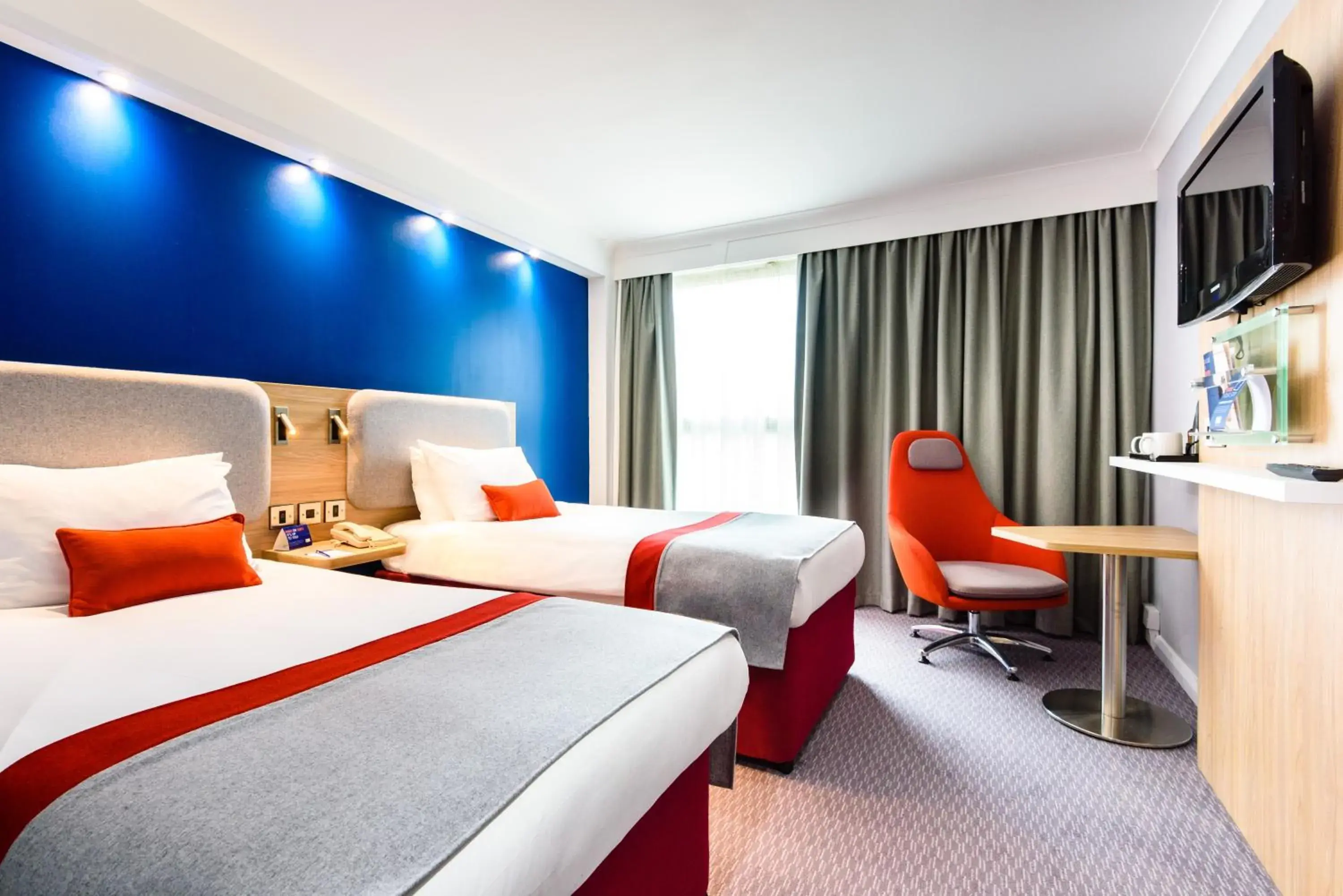 Bed in Holiday Inn Express London Stansted Airport by IHG Bed in Holiday Inn Express London Stansted Airport by IHG