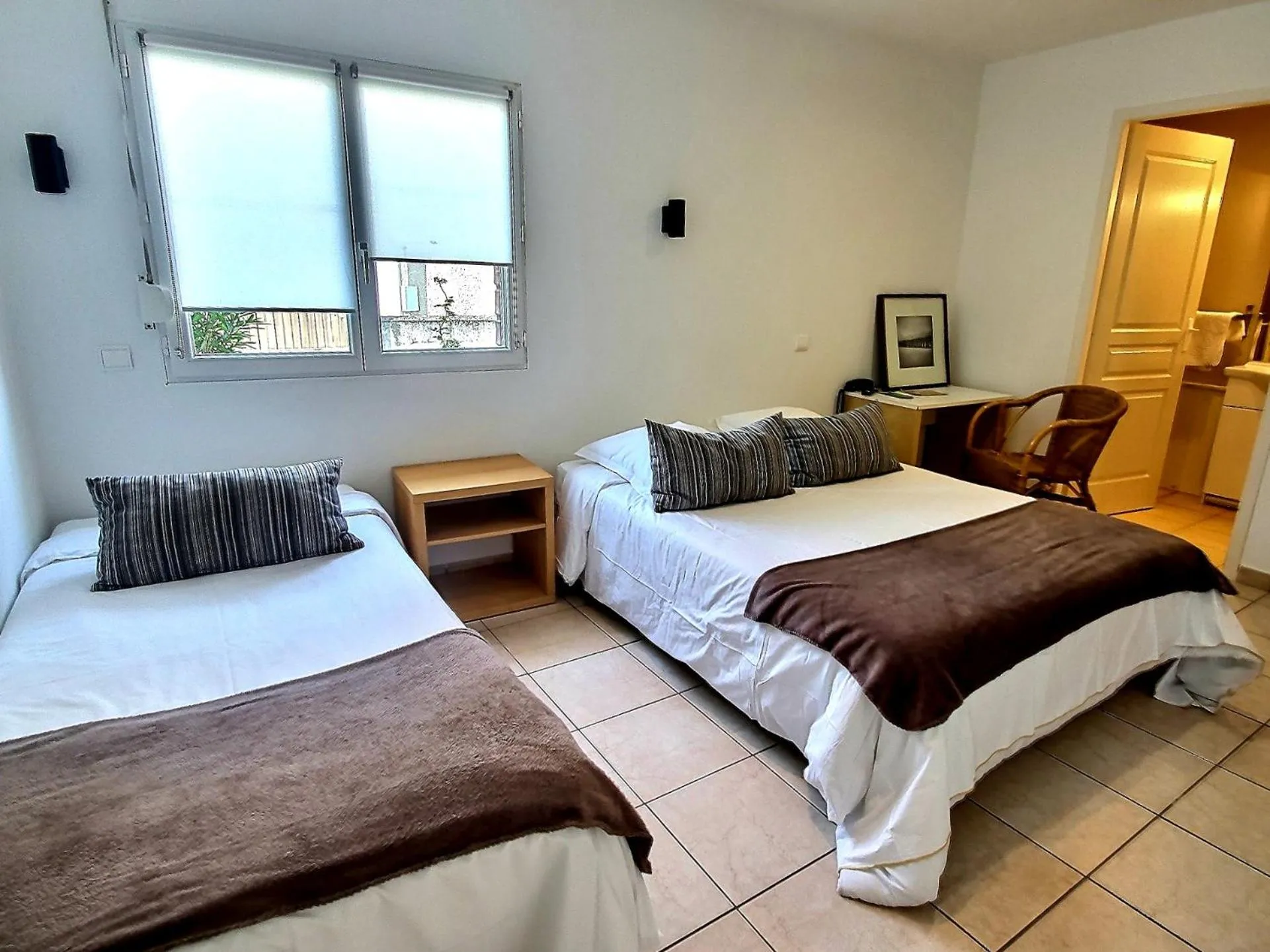 Bed in Atlantis Hôtel