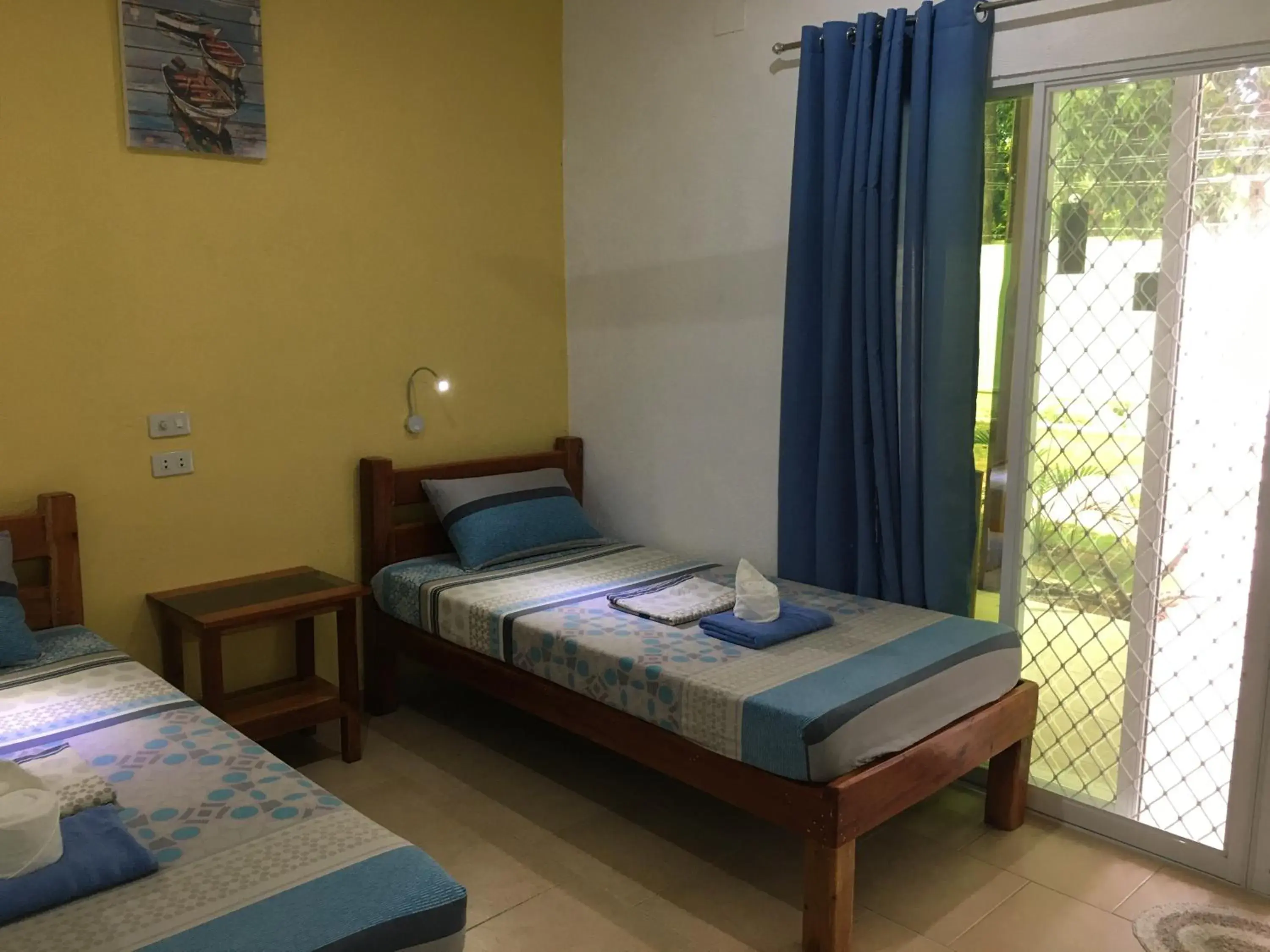 Bed in Alona Gecko Inn Bed in Alona Gecko Inn