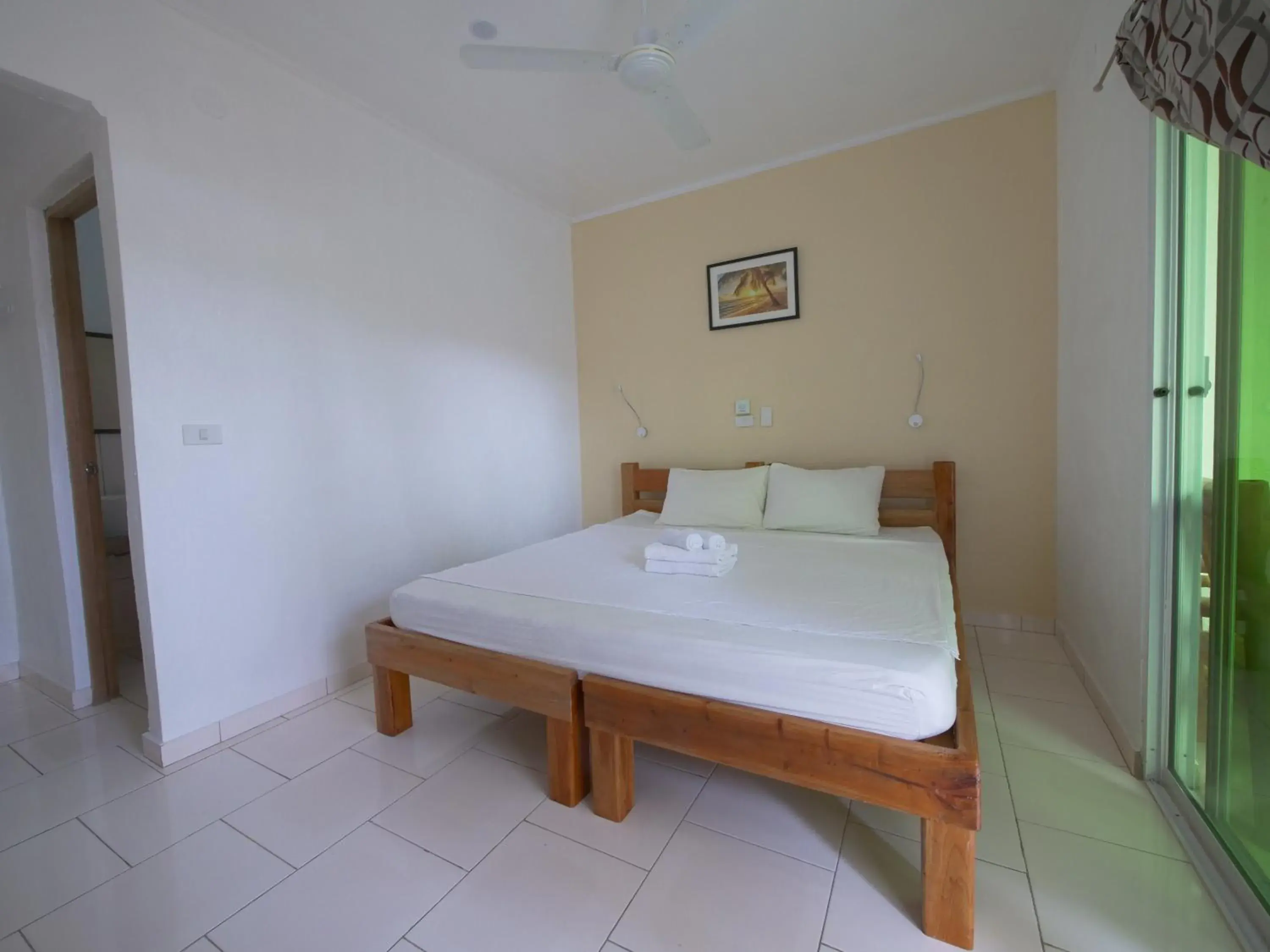 Bed in Alona Gecko Inn Bed in Alona Gecko Inn