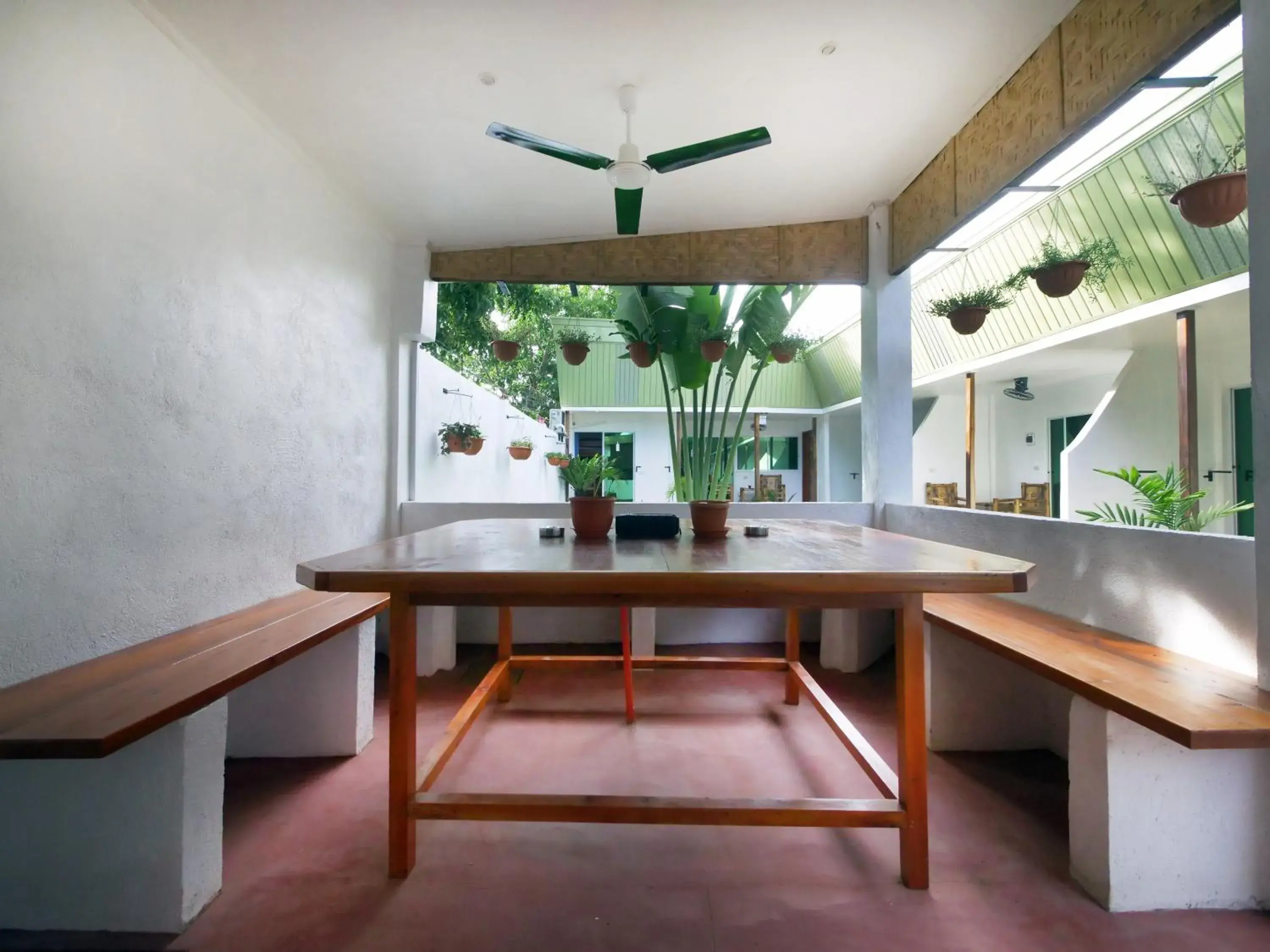 Communal lounge/ TV room in Alona Gecko Inn Communal lounge/ TV room in Alona Gecko Inn