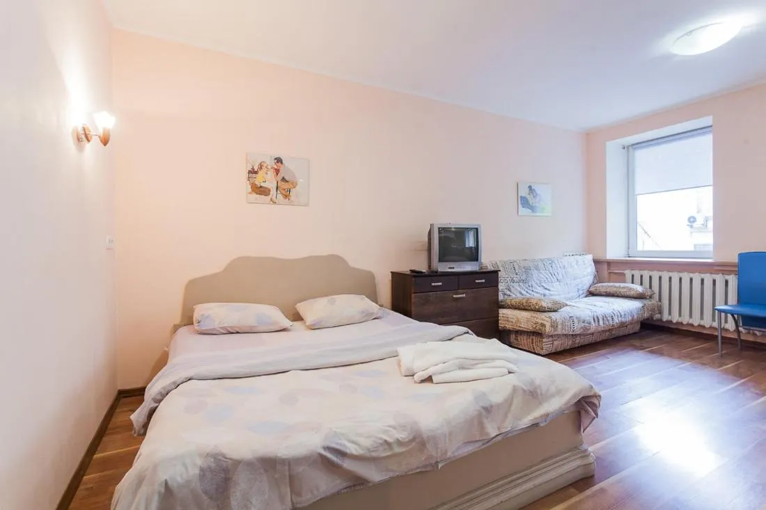 Bed in Cozy apartments near Olympic Stadium