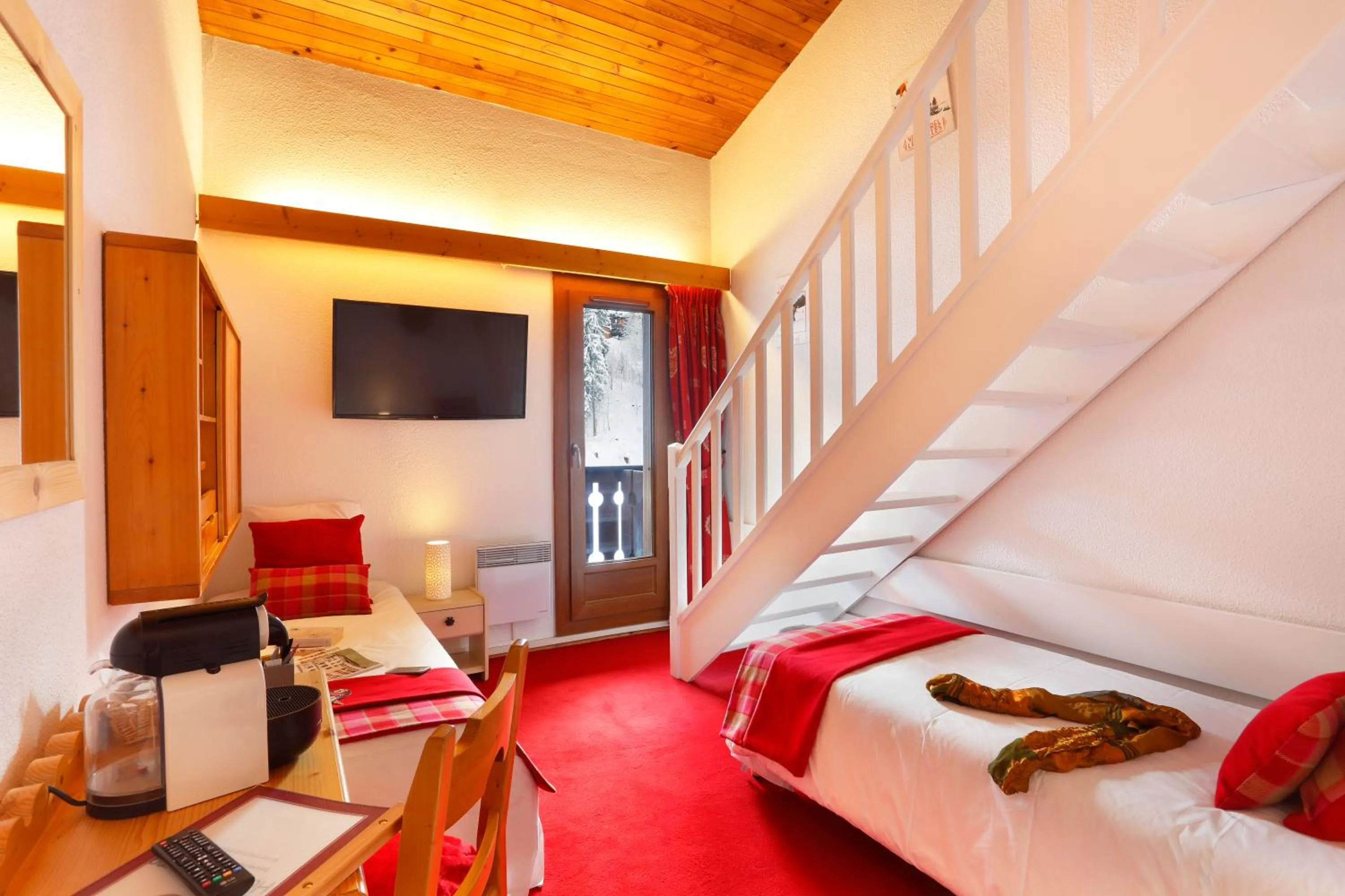 Bed in Hôtel du Bourg