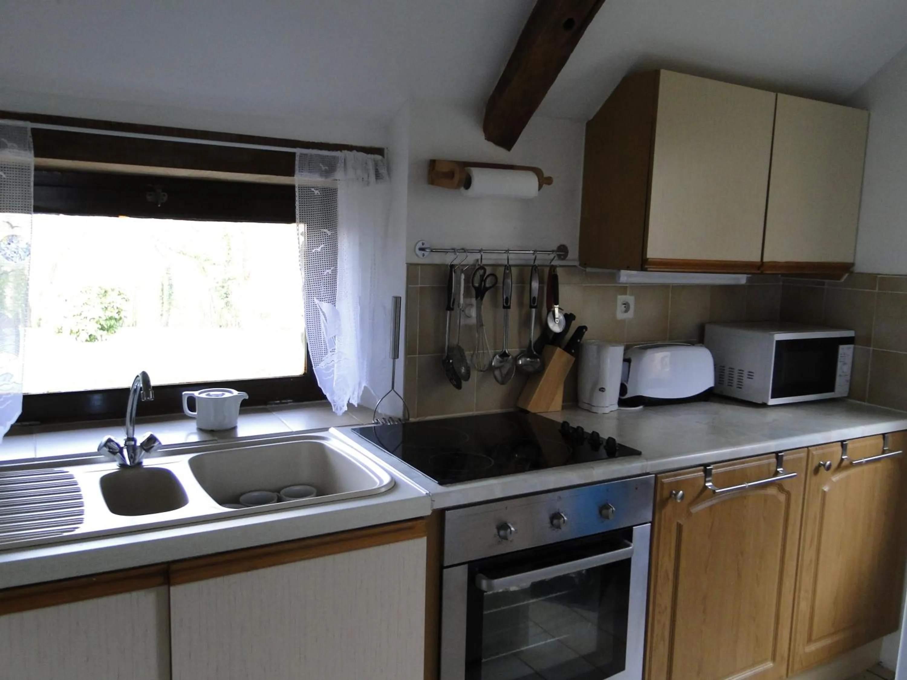 Kitchen or kitchenette in Gites de la Motte Parent