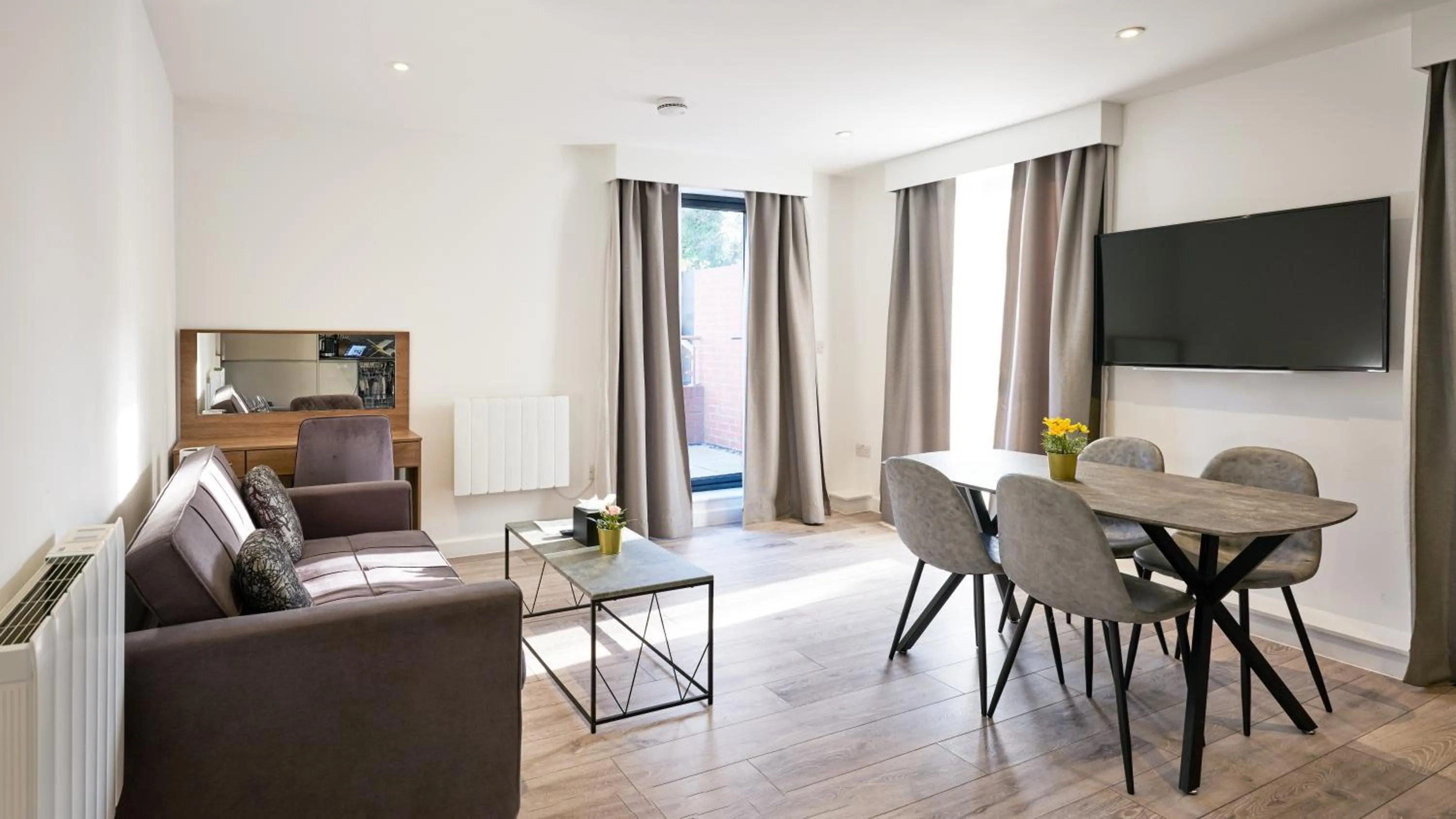 Living room in Hampton Suites Serviced Apartments