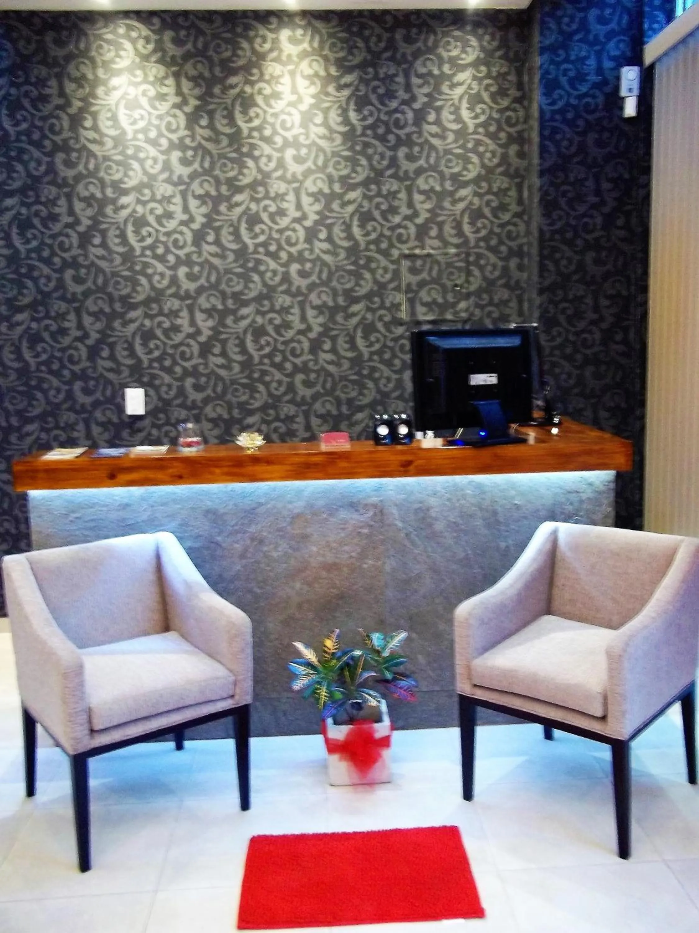 Communal lounge/ TV room in Kitek Hotel Boutique