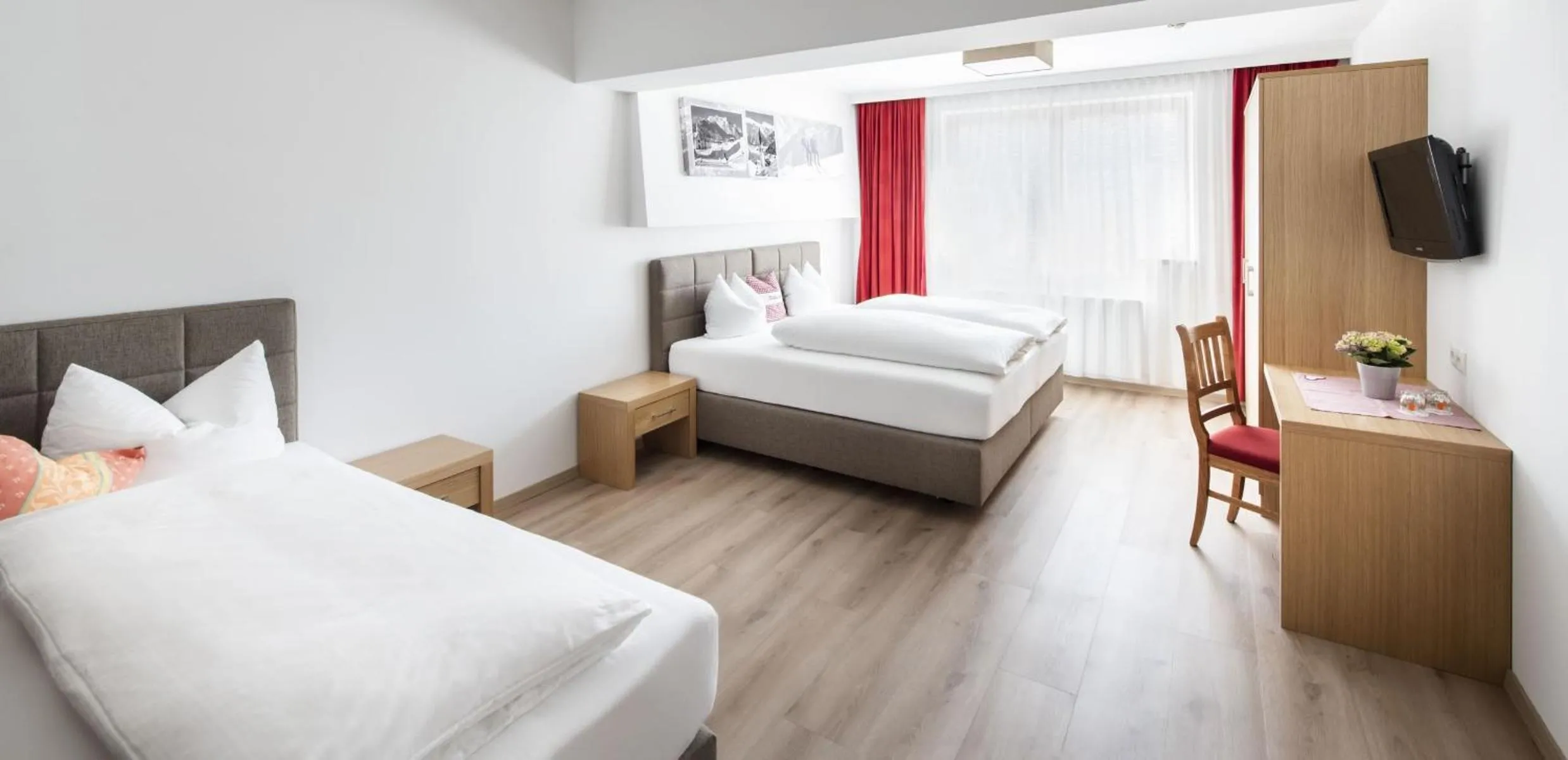 Photo of the whole room, Bed in Hotel Neuwirt