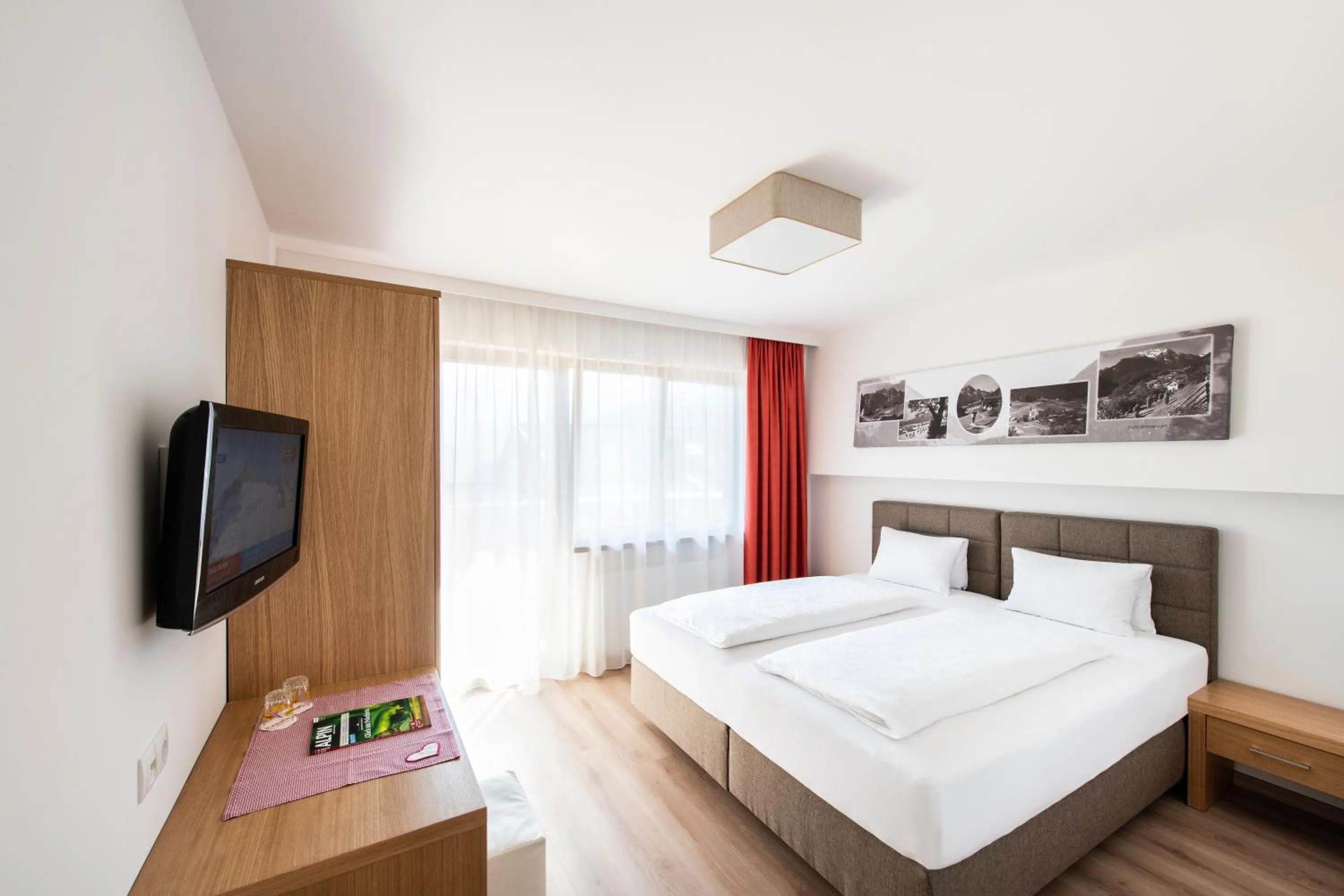 Photo of the whole room, Bed in Hotel Neuwirt