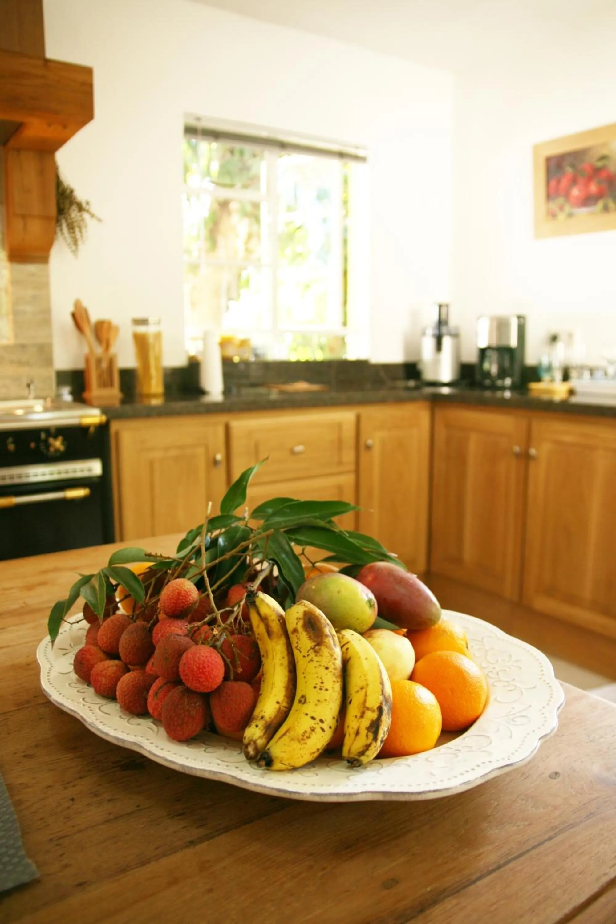 Kitchen or kitchenette in Maison D’hôtes Coignet