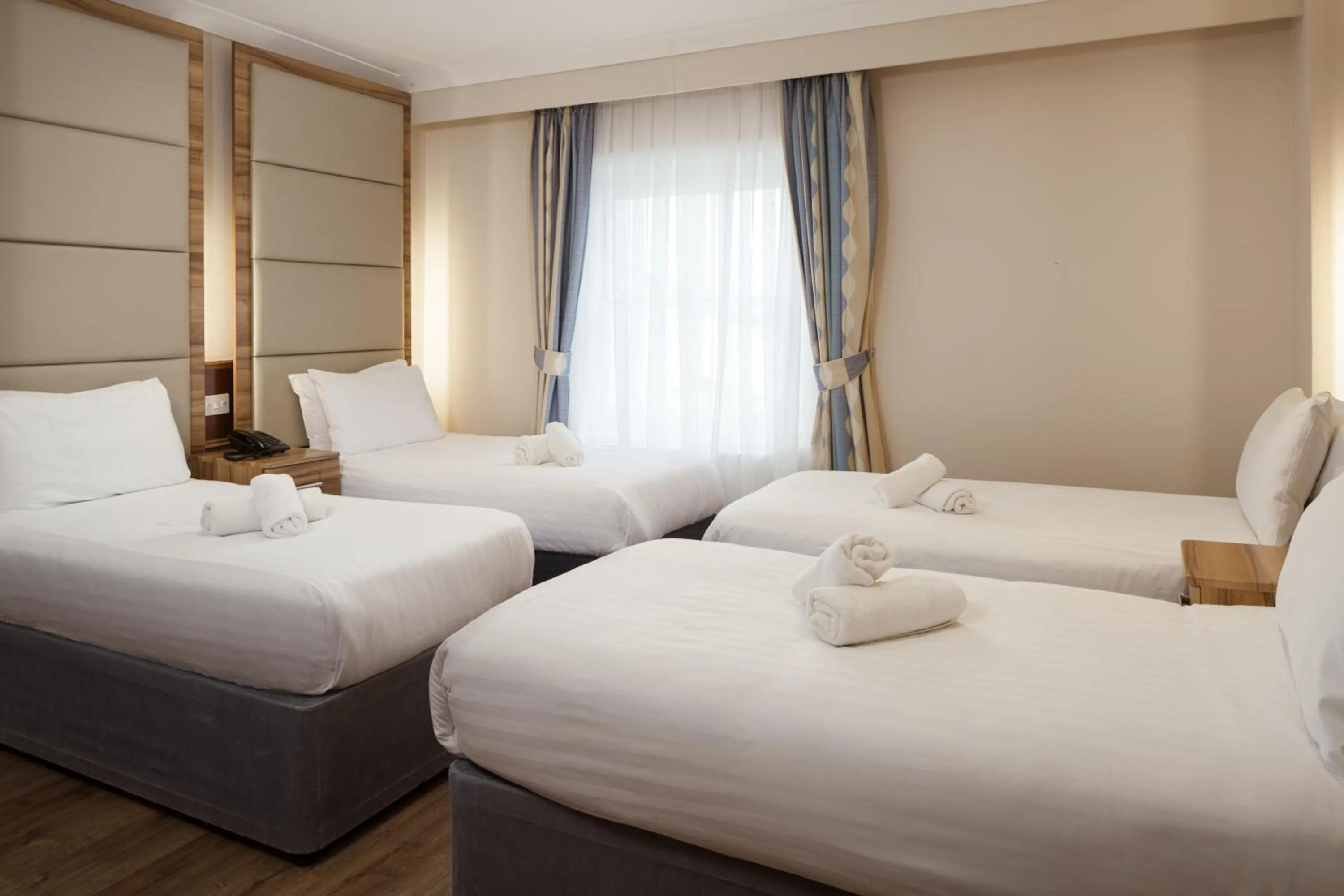 Bed in Royal Eagle Hotel