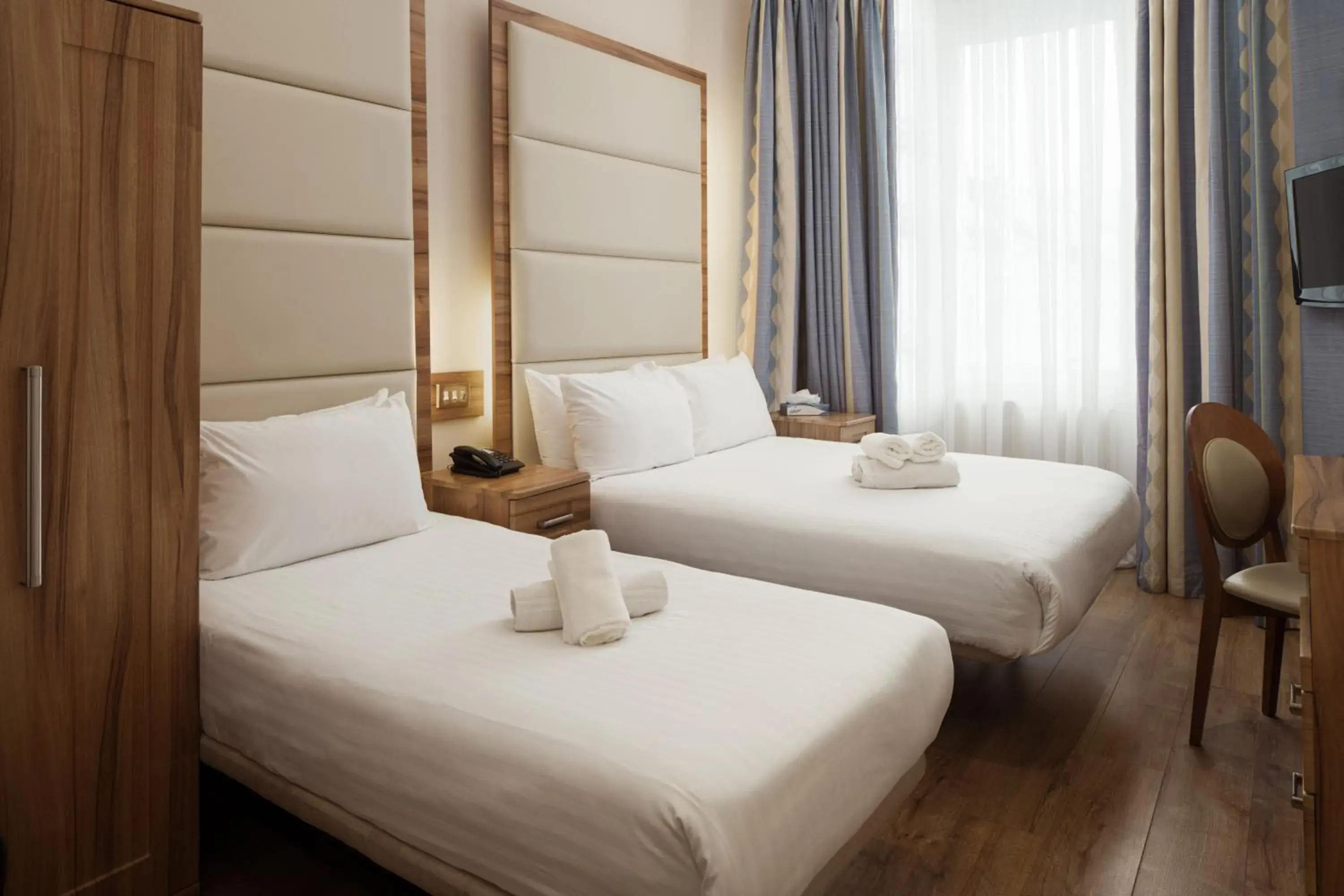 Bed in Royal Eagle Hotel Bed in Royal Eagle Hotel