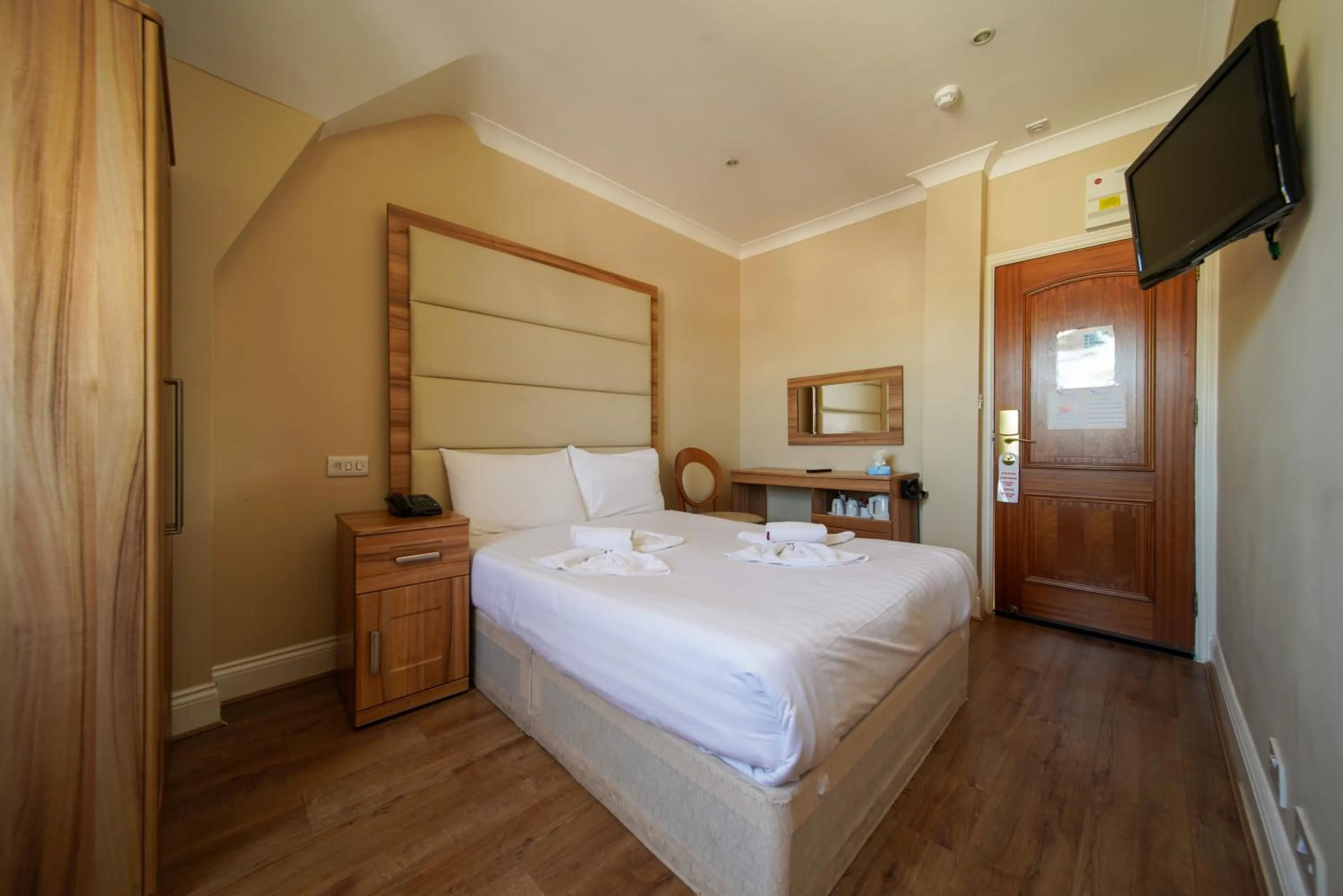 Bed in Royal Eagle Hotel