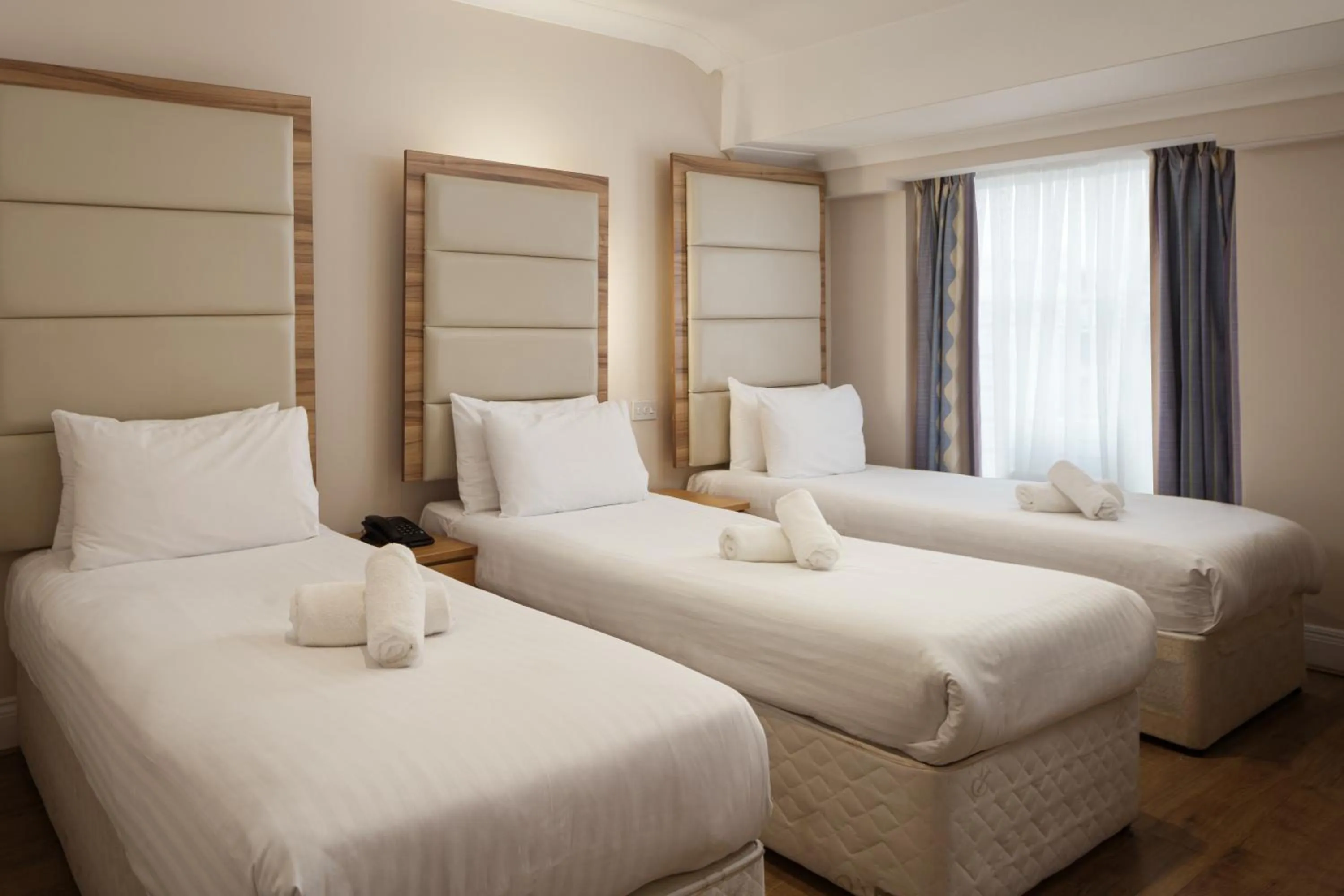 Bed in Royal Eagle Hotel