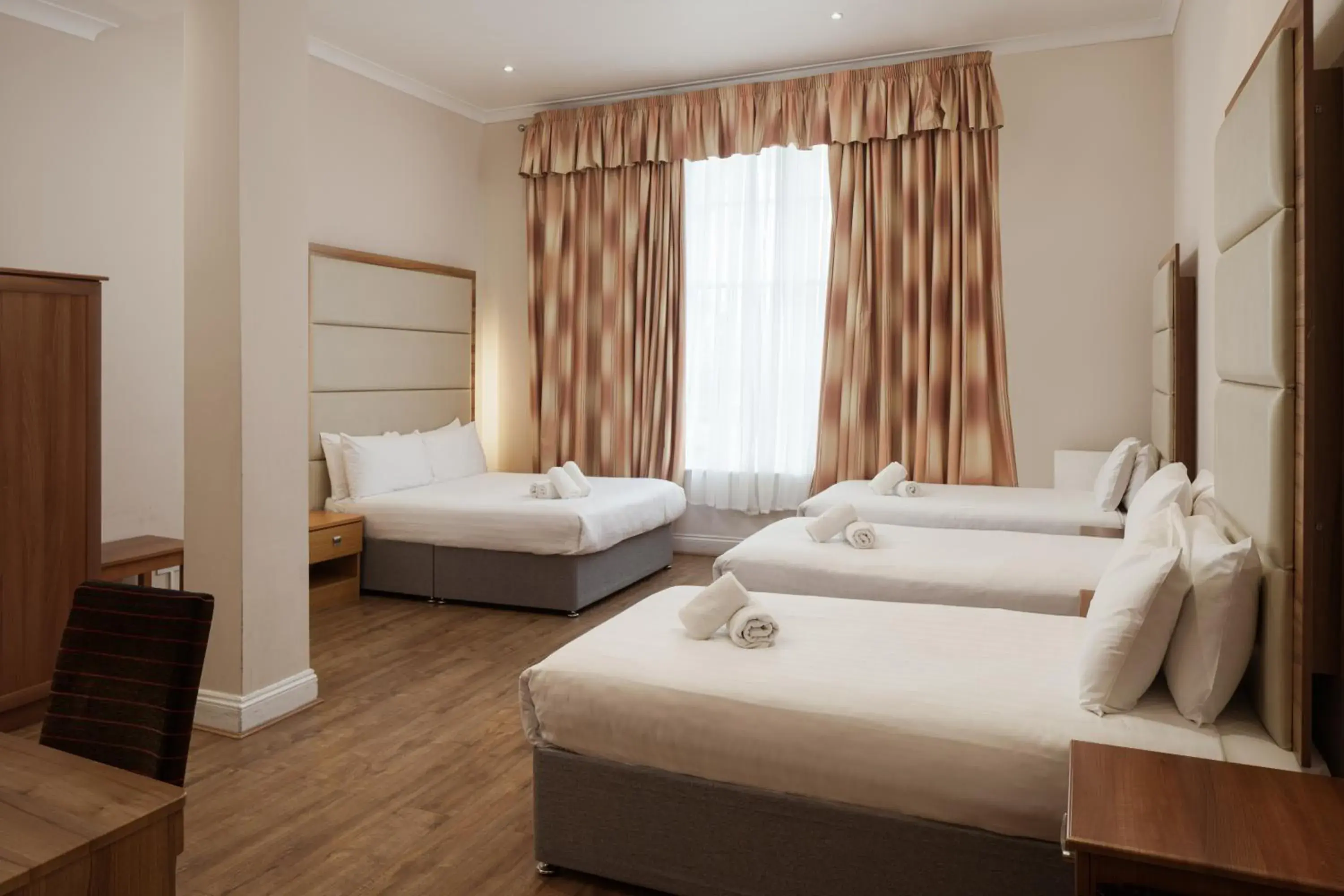 Bed in Royal Eagle Hotel Bed in Royal Eagle Hotel