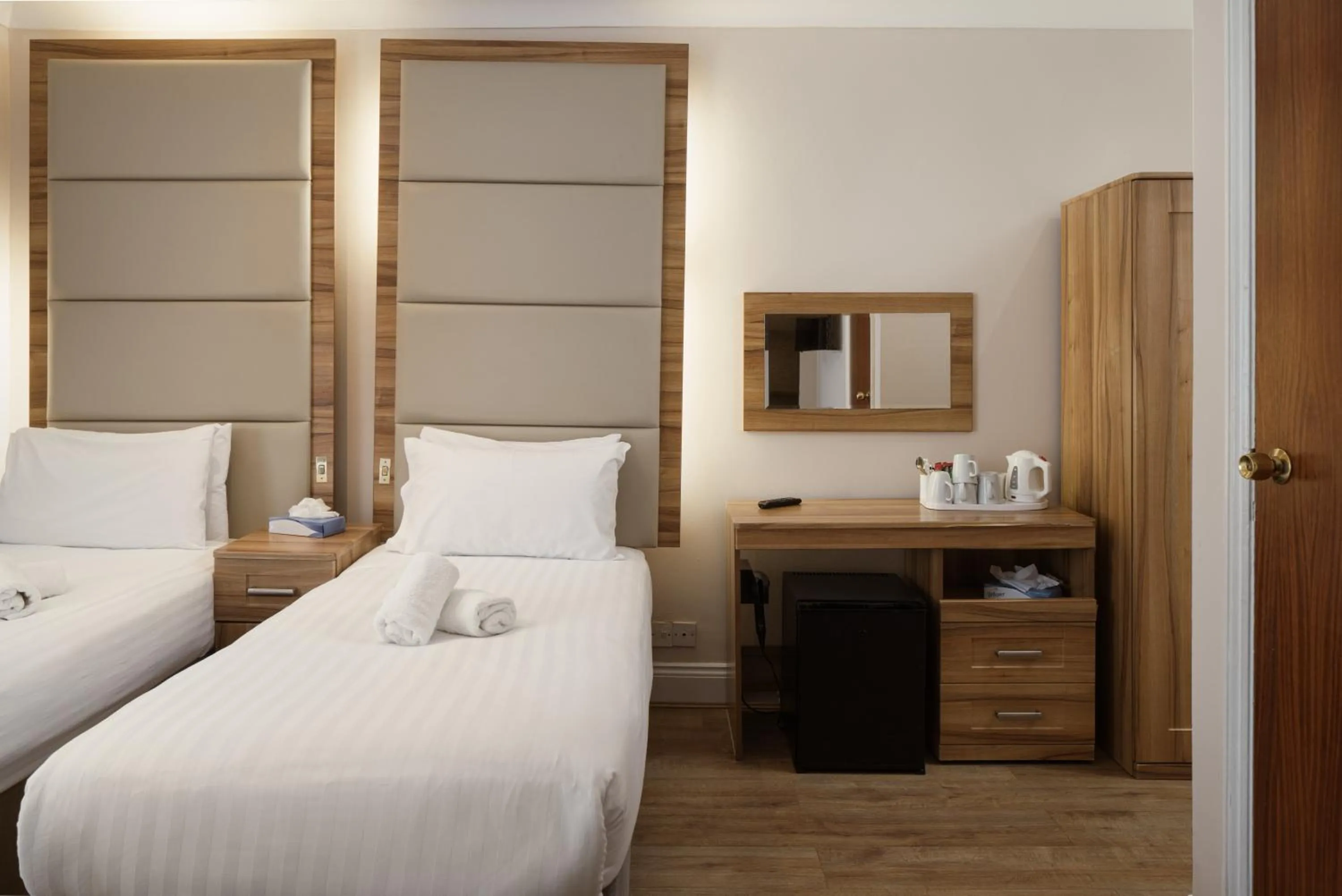 Bed in Royal Eagle Hotel