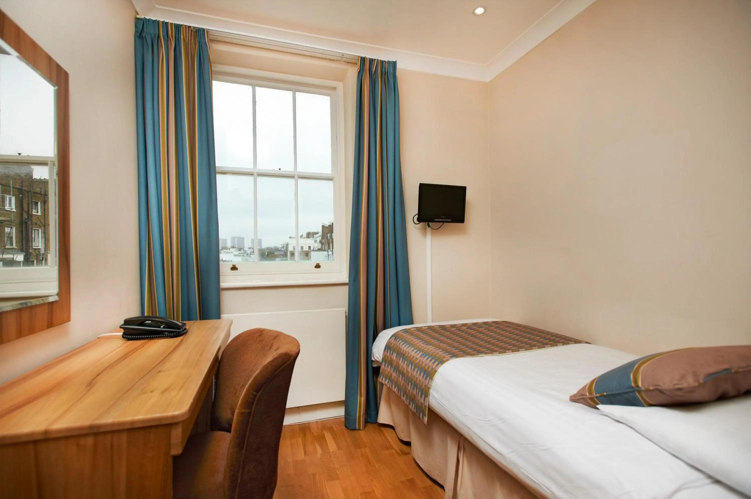 Bed in Royal Eagle Hotel