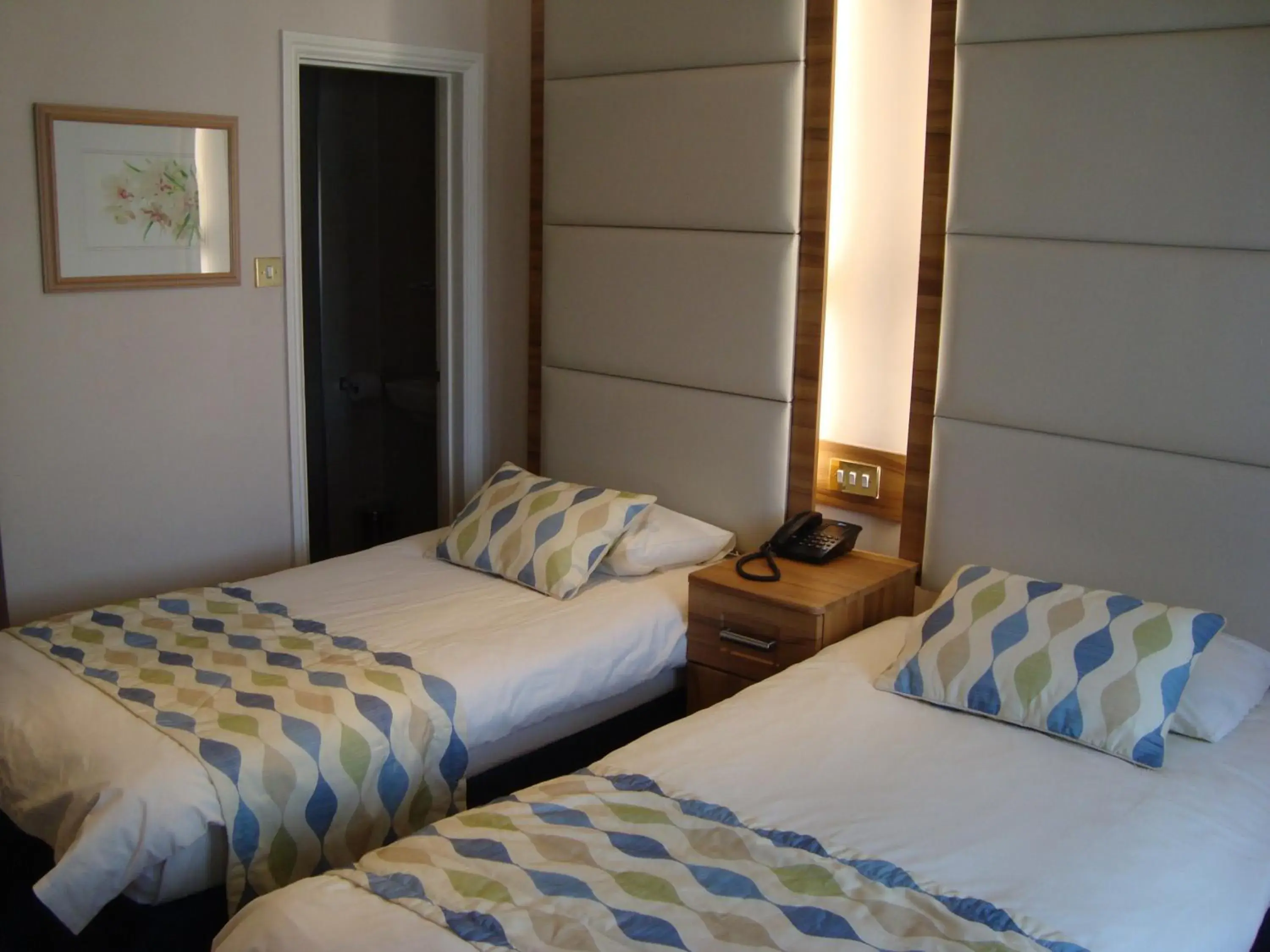 Bed in Royal Eagle Hotel Bed in Royal Eagle Hotel