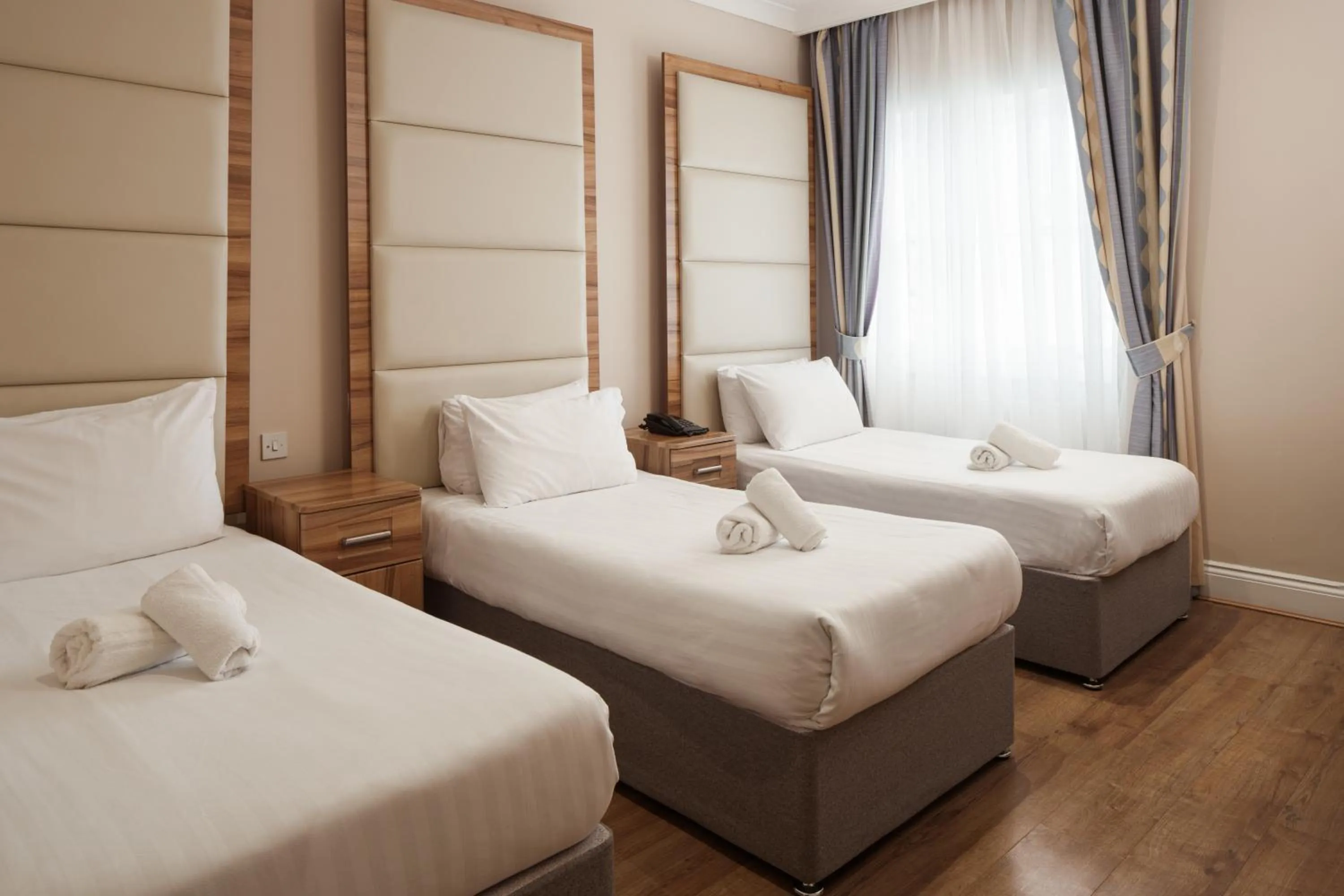 Bed in Royal Eagle Hotel