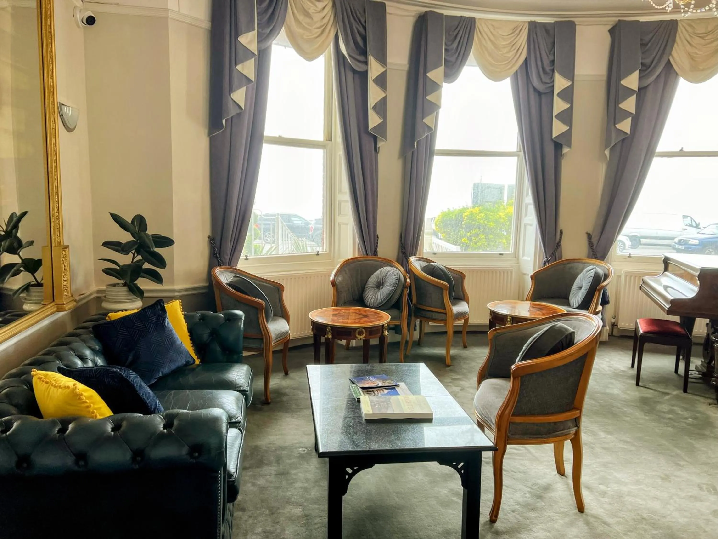 Communal lounge/ TV room in The Lanes Hotel