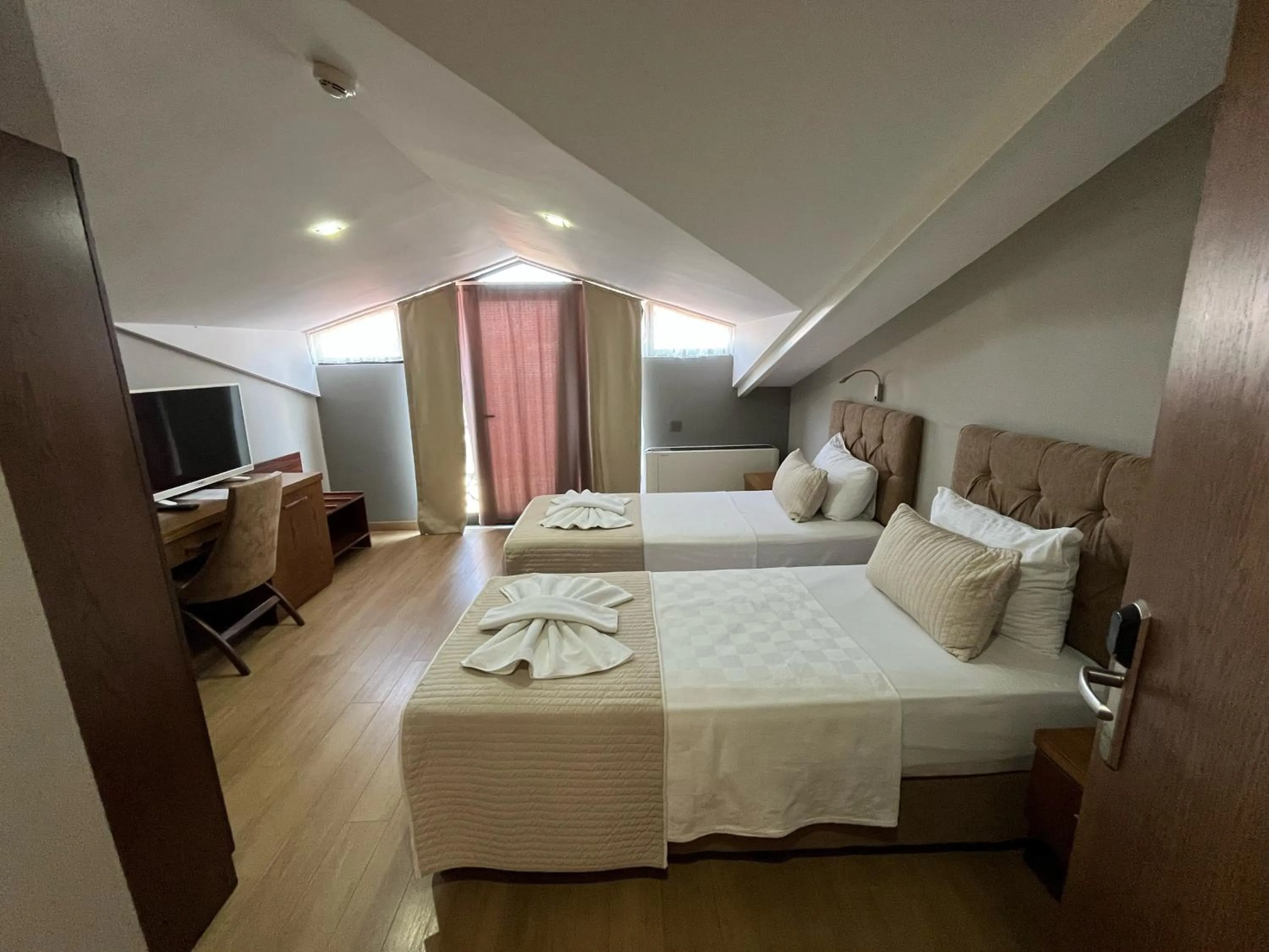 Bed in The Elegant Hotel