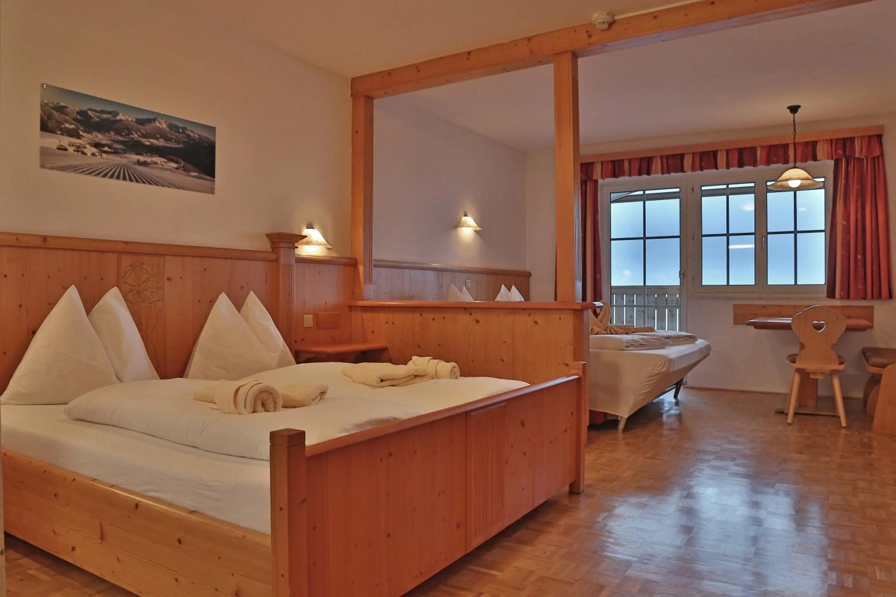 Living room, Bed in Aparthotel Paradies - Schrempfgut