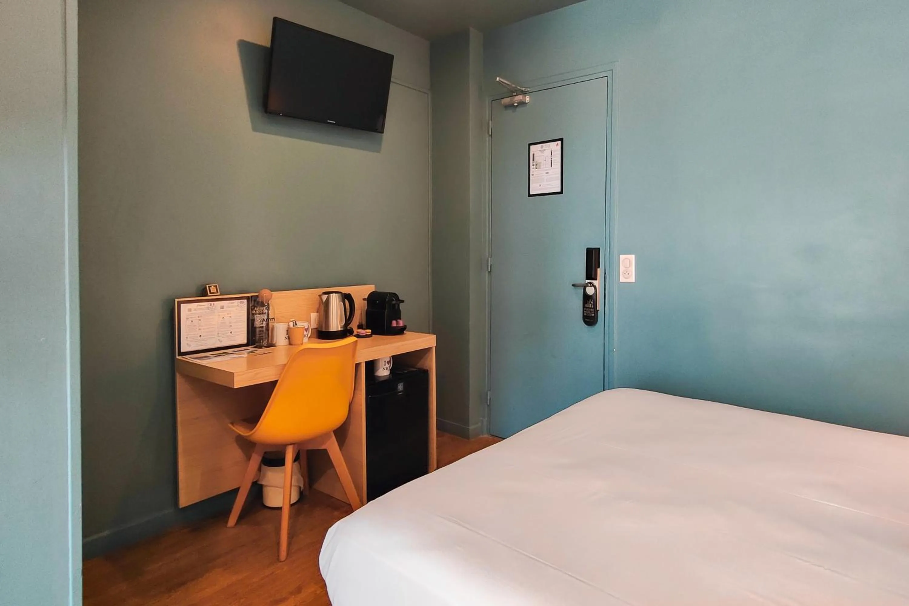 Photo of the whole room, Bed in Hôtel Du Centre, un hôtel AMMI