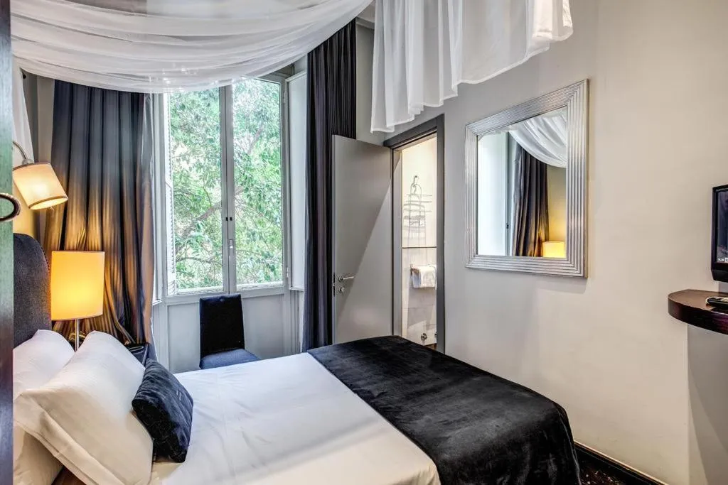 Bed in Hotel Giuggioli