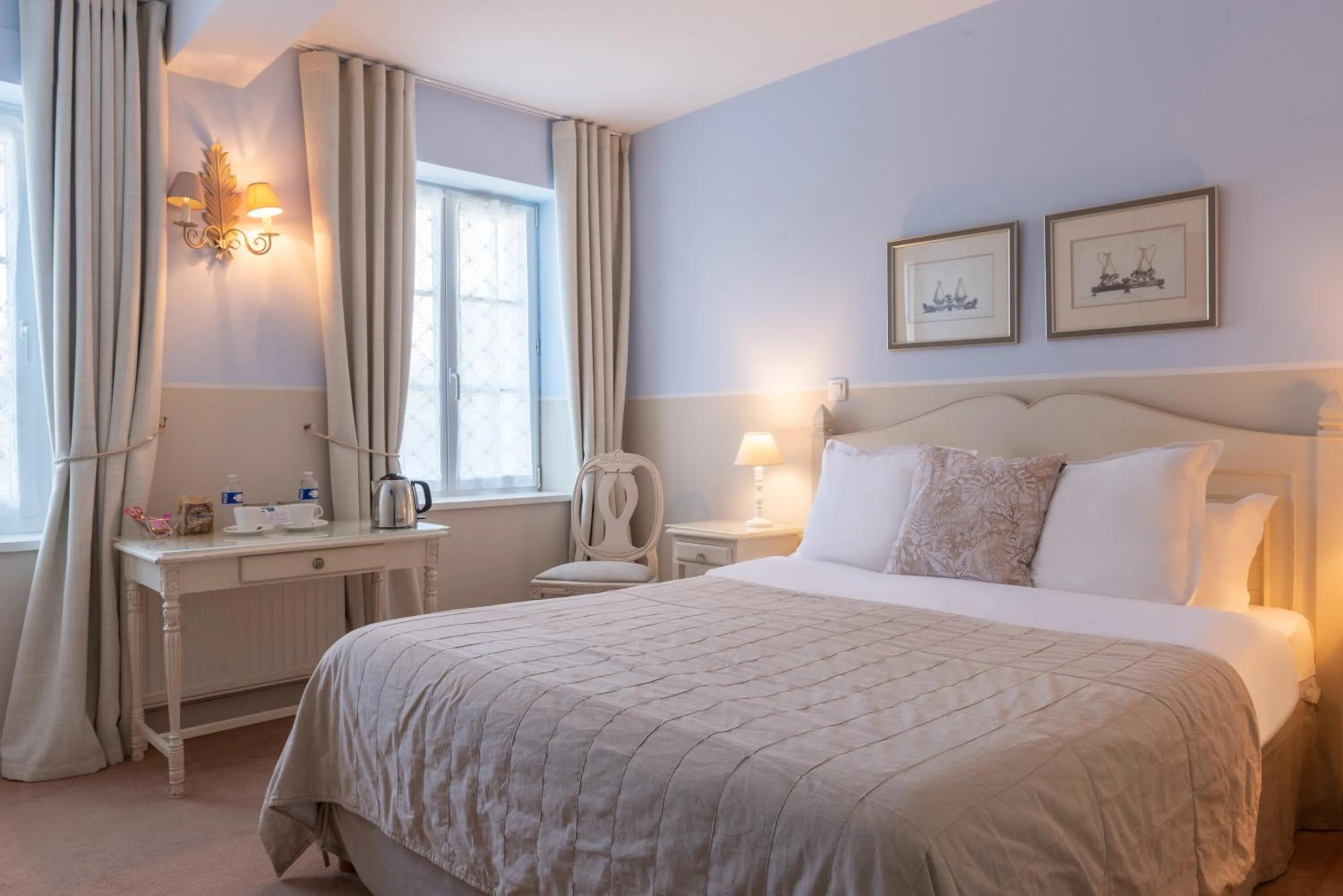 Bed in Hôtel Traiteur Les Ormes, The Originals Relais