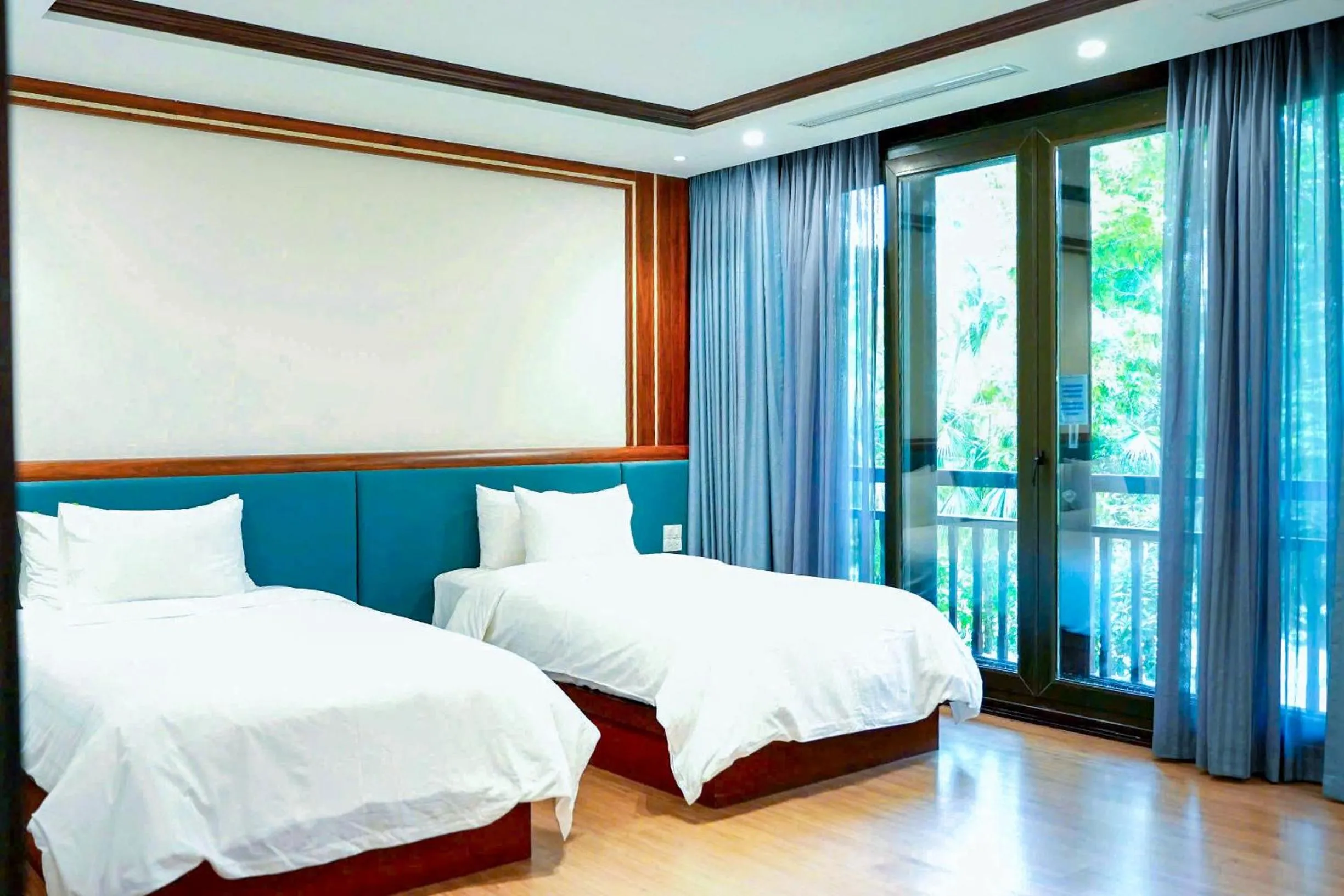 Bed in NCC Garden Villas - NCC Hotel