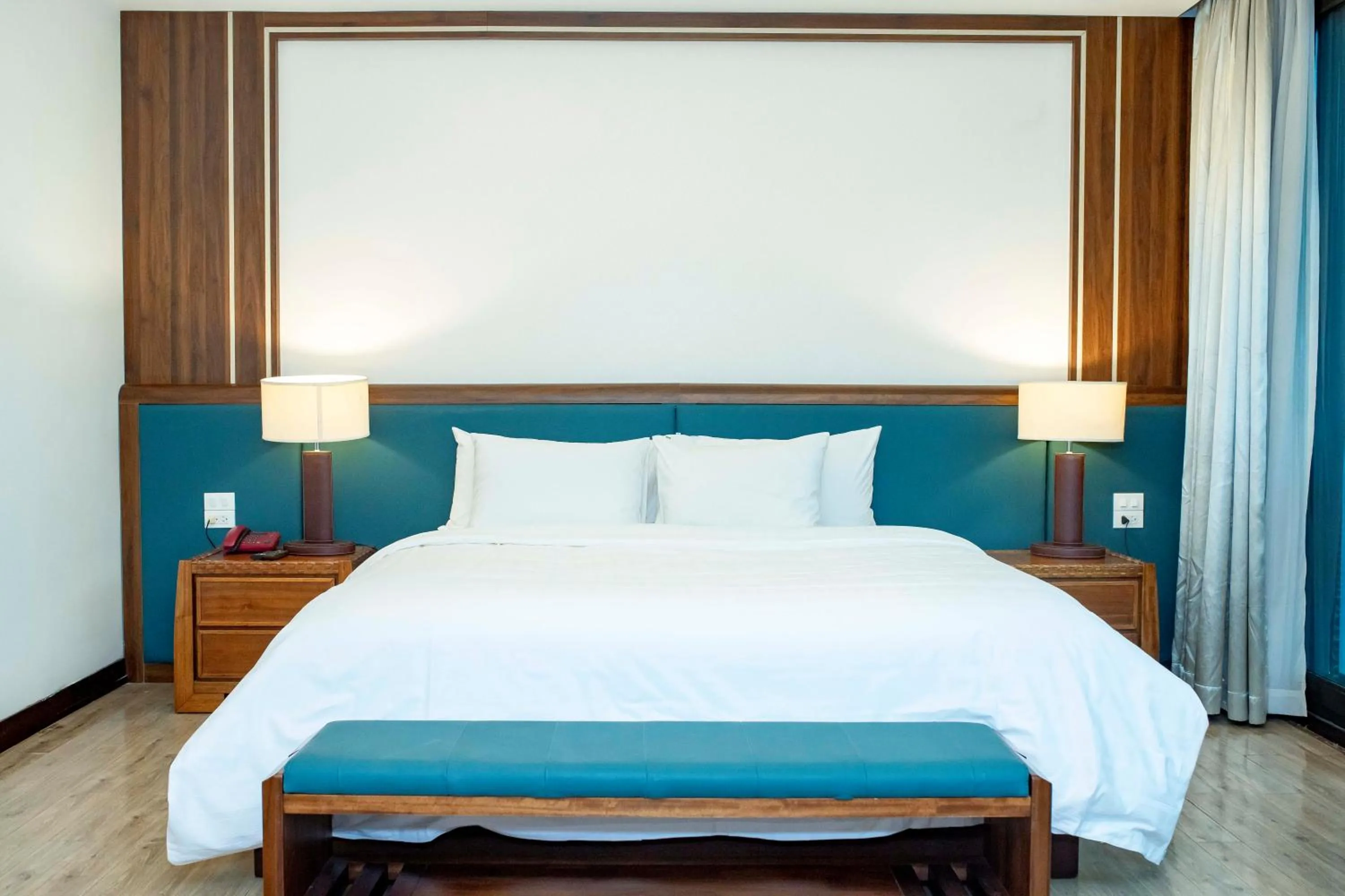 Bed in NCC Garden Villas - NCC Hotel